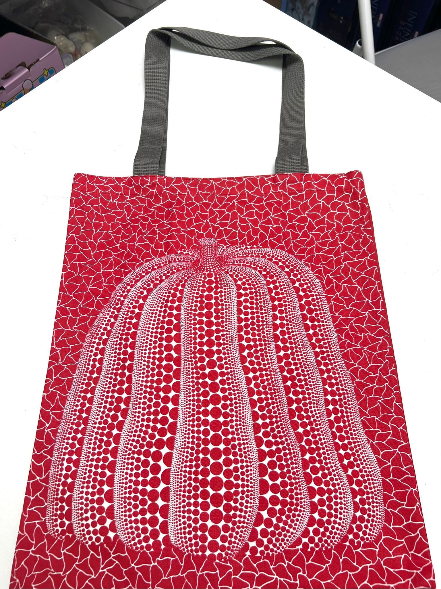 “Red Pumpkin” Tote Bag from YAYOI KUSAMA PRINT WORKS: REPETITION & PROLIFERATION