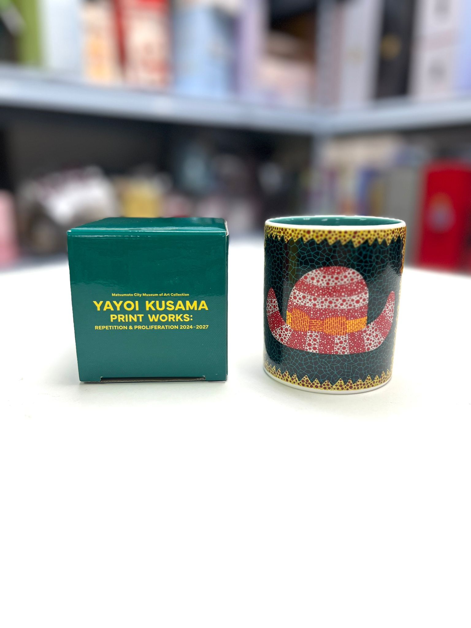 “Hat” Mug from YAYOI KUSAMA PRINT WORKS: REPETITION &&nbsp;PROLIFERATION