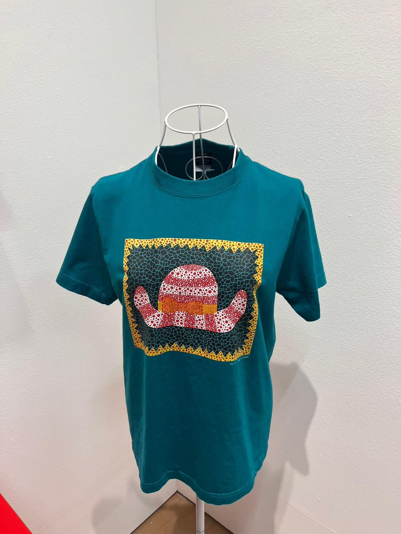 “HAT” Tee from YAYOI KUSAMA PRINT WORKS: REPETITION &&nbsp;PROLIFERATION