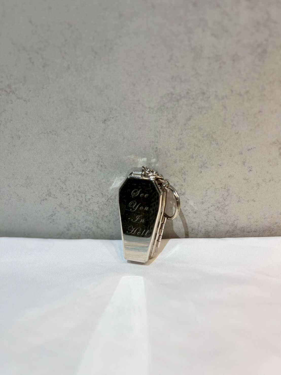 SUPREME® COFFIN KEYCHAIN