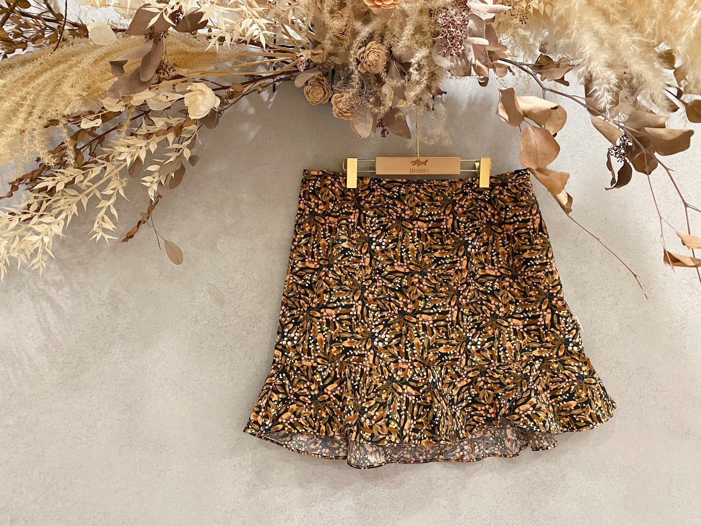 黑底棕葉 波浪連褲短裙(L)