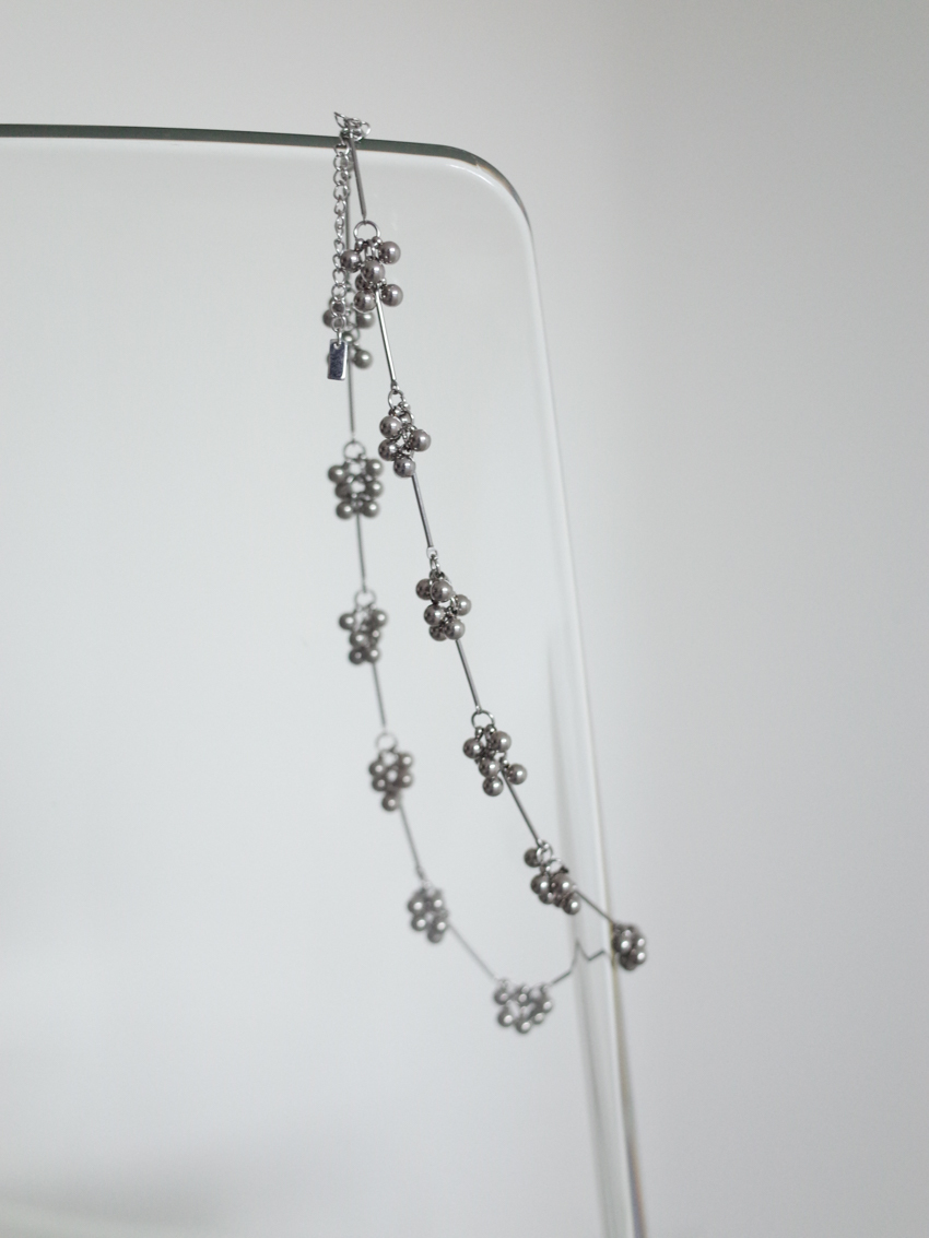 delicate vertical necklace with small bead details