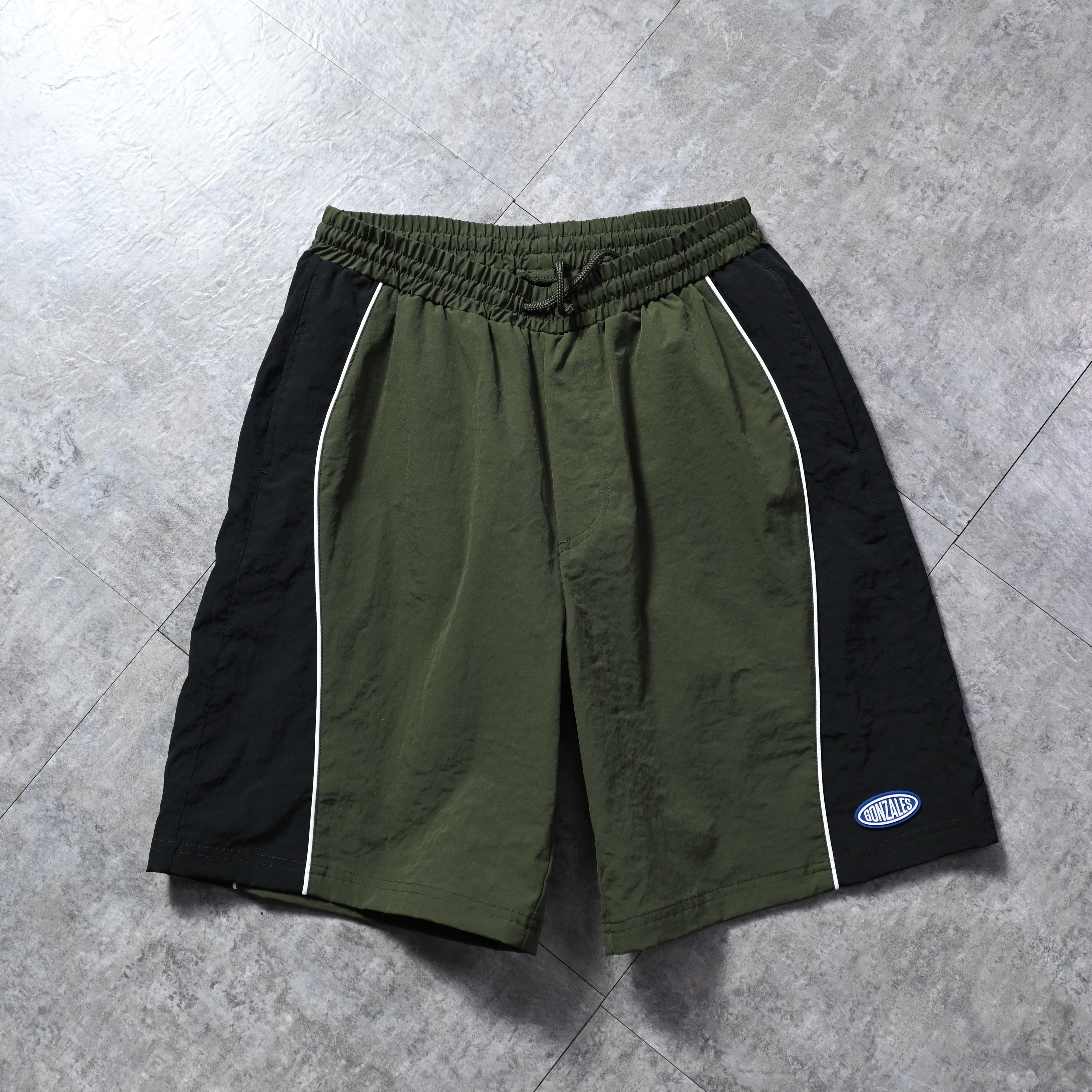 (What it isNt) ART BY MARK GONZALES Piping track shorts