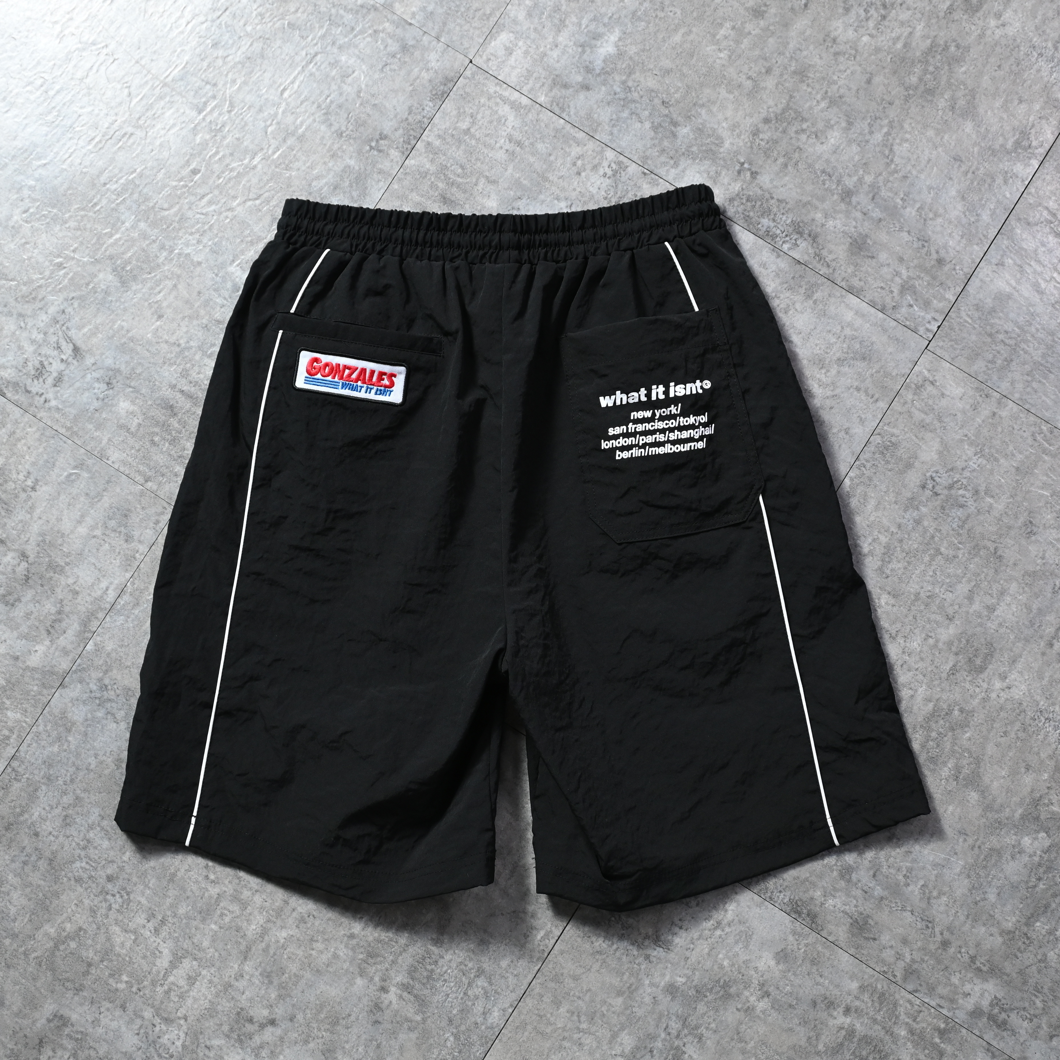 (What it isNt) ART BY MARK GONZALES Piping track shorts