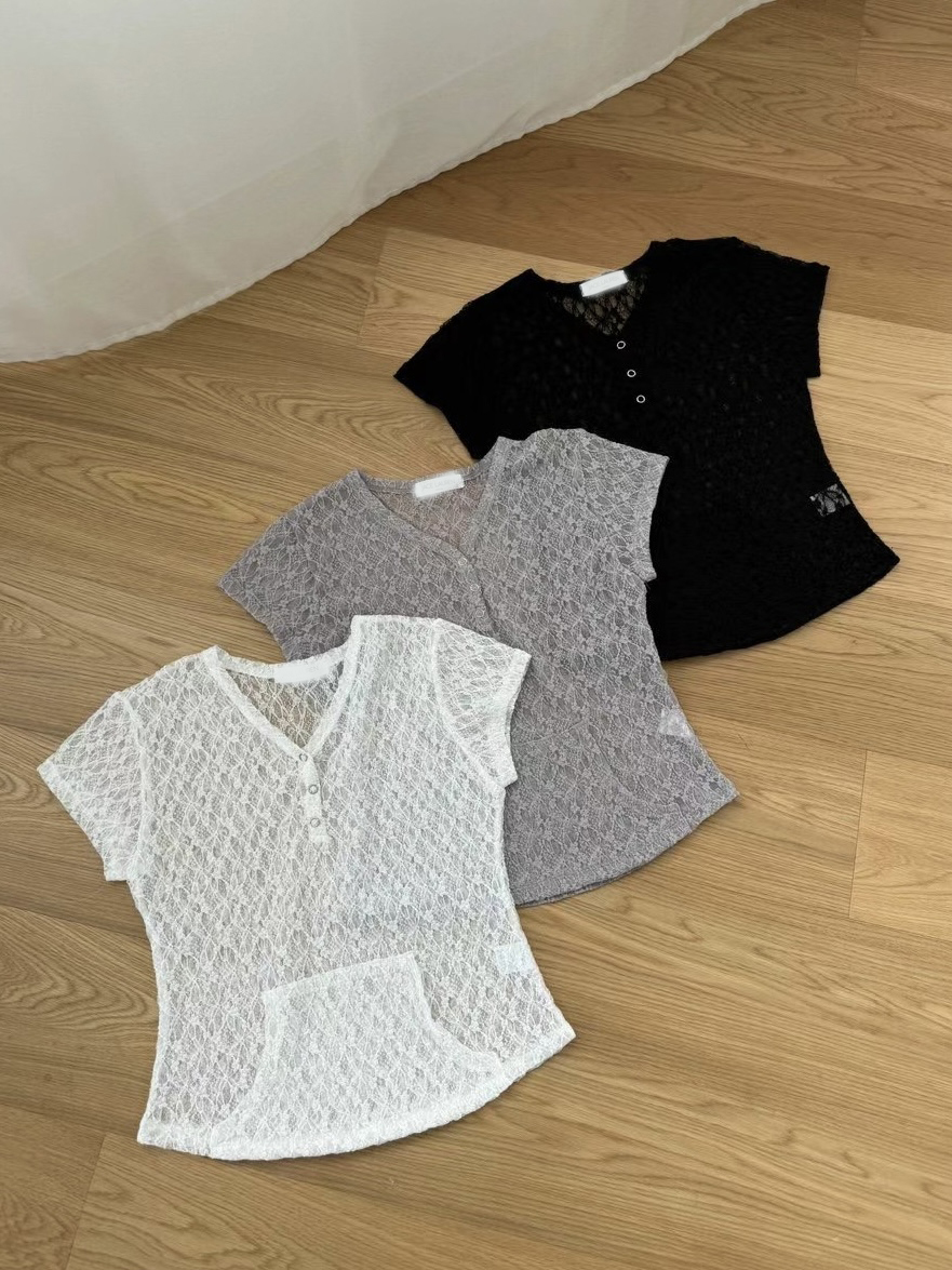 feminine lace top with button front, waist shaping, and pockets