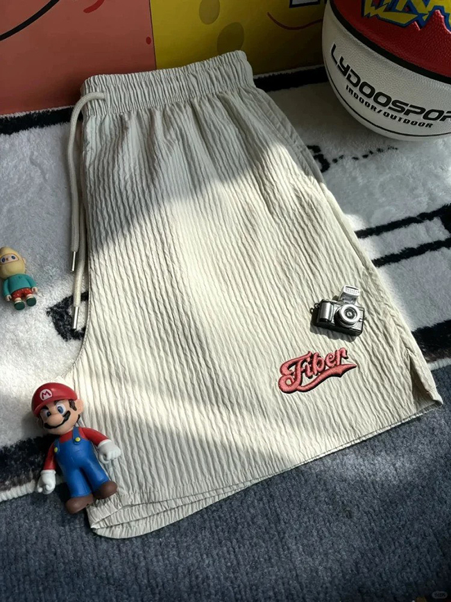 美式薄款繡花壓褶短褲-少量現貨