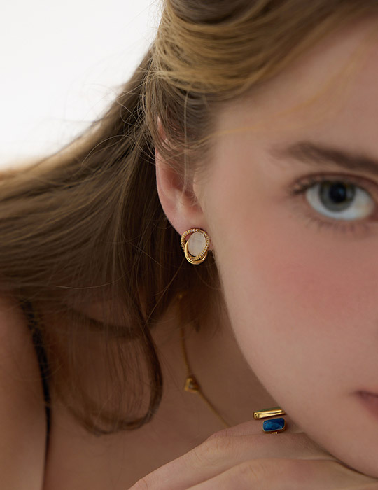 輕奢閃耀交錯貓眼。夾式耳環