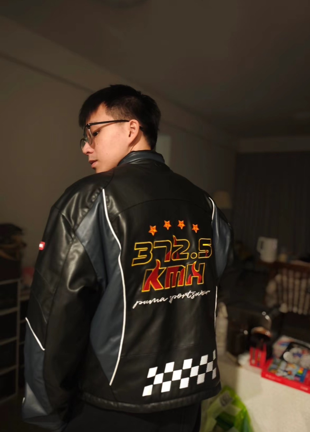 PUMA BEYOND THE SPEED 美式復古PU立領外套 黑色 男女同款