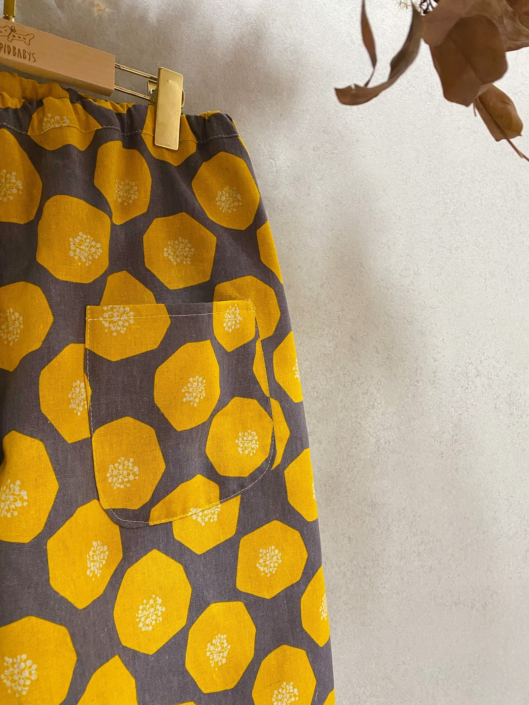 黃八邊形麵包 媽咪農夫褲