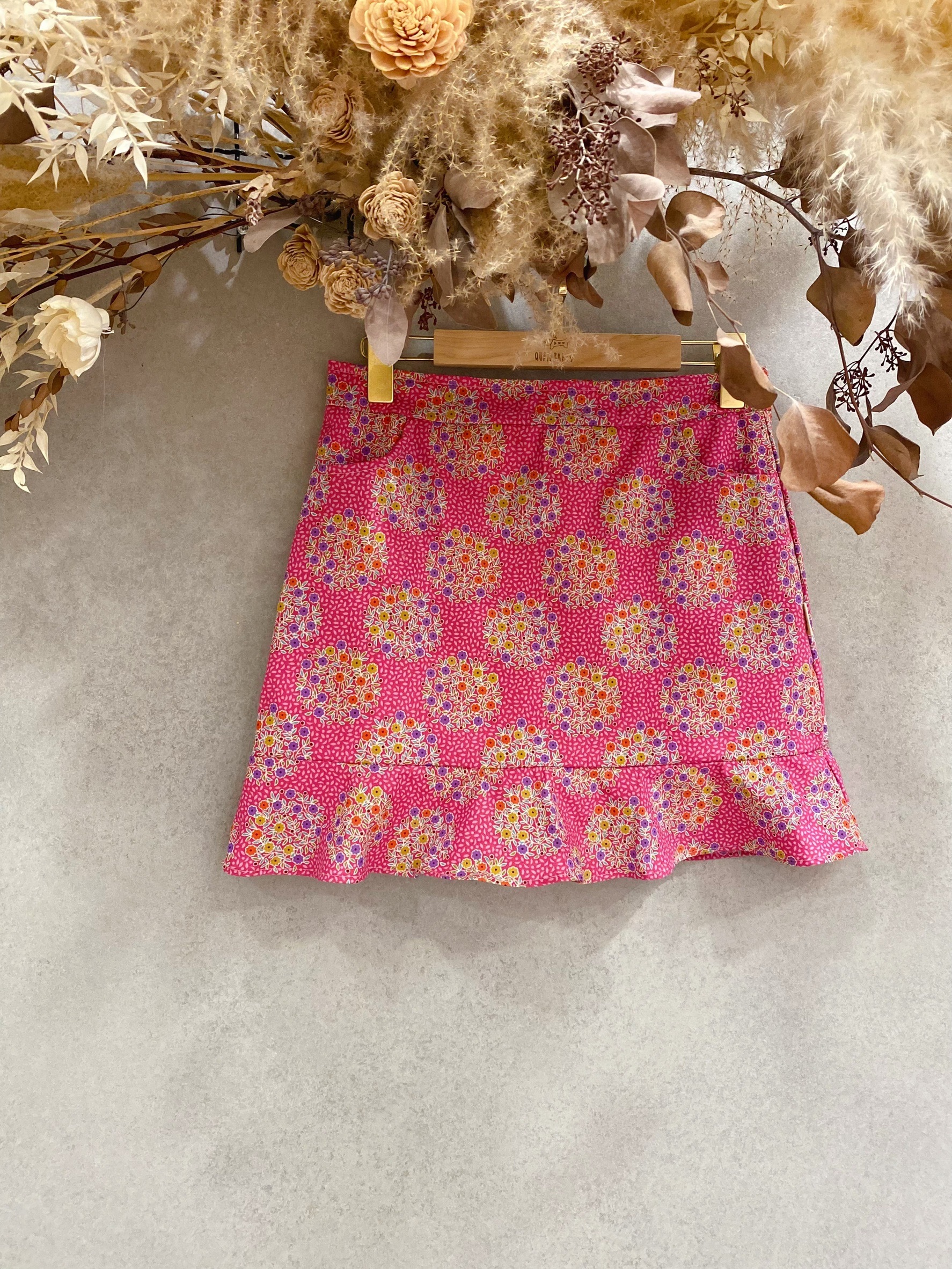 tilda粉花圈 媽咪大荷葉連褲短裙(XS)