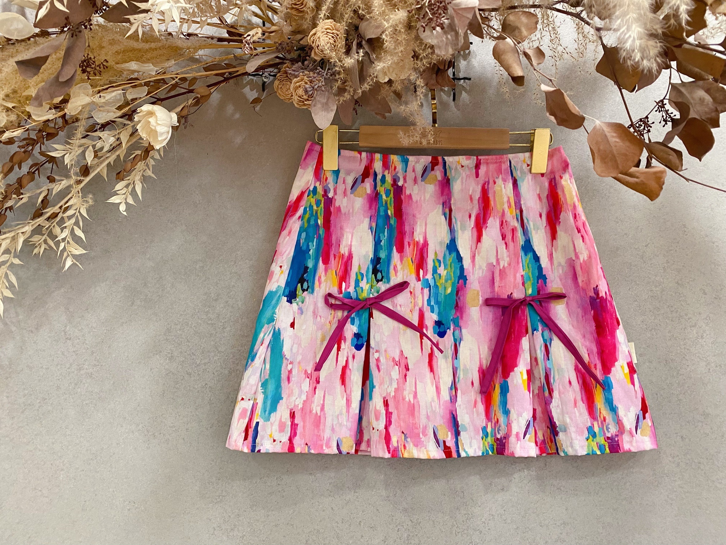 粉波瀾 媽咪蝴蝶結連褲短裙(S)