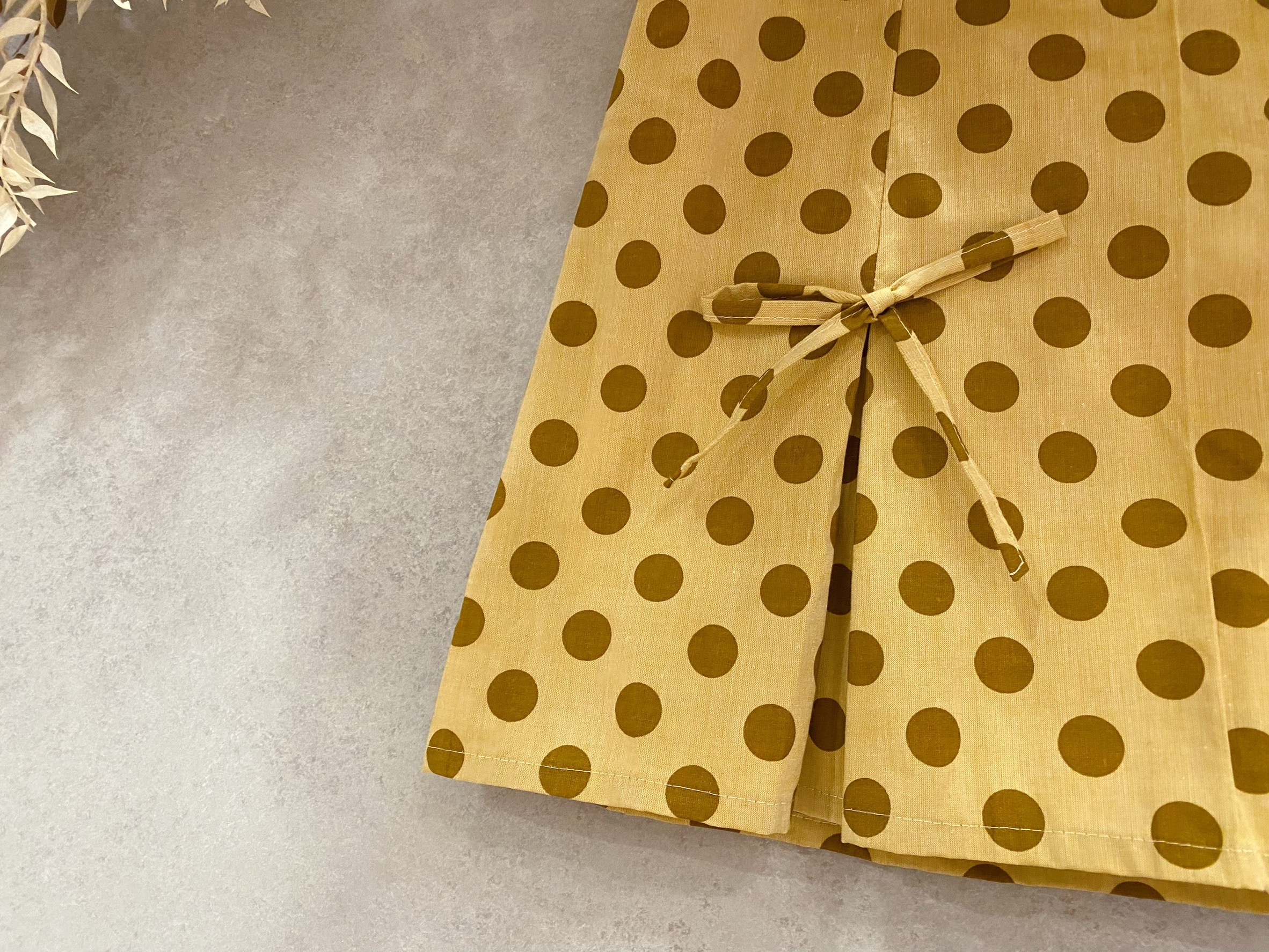 tilda 奶茶水玉 媽咪蝴蝶結連褲短裙(XS)