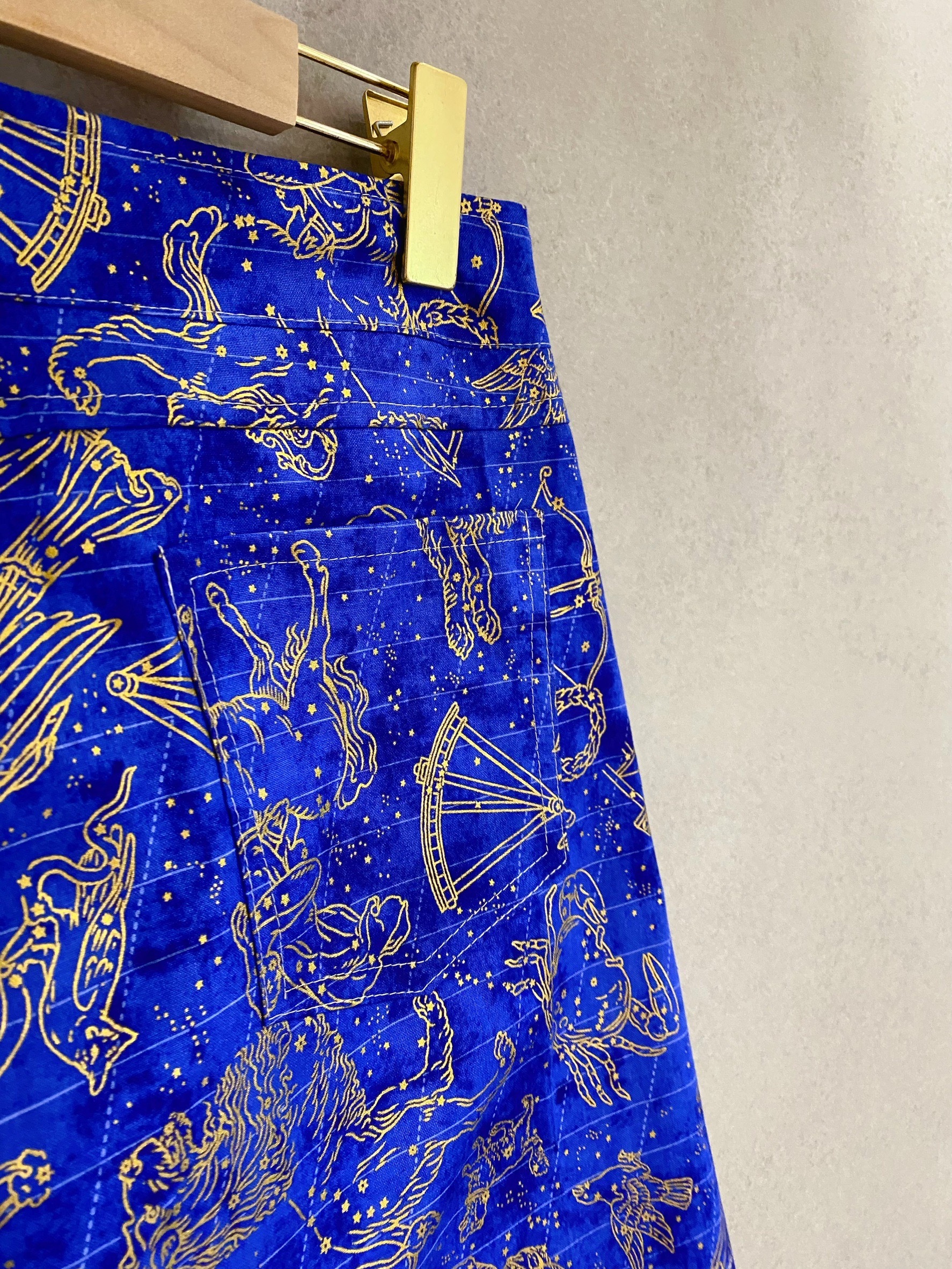 燙金寶藍星座 媽咪斜邊排釦連褲短裙(S)