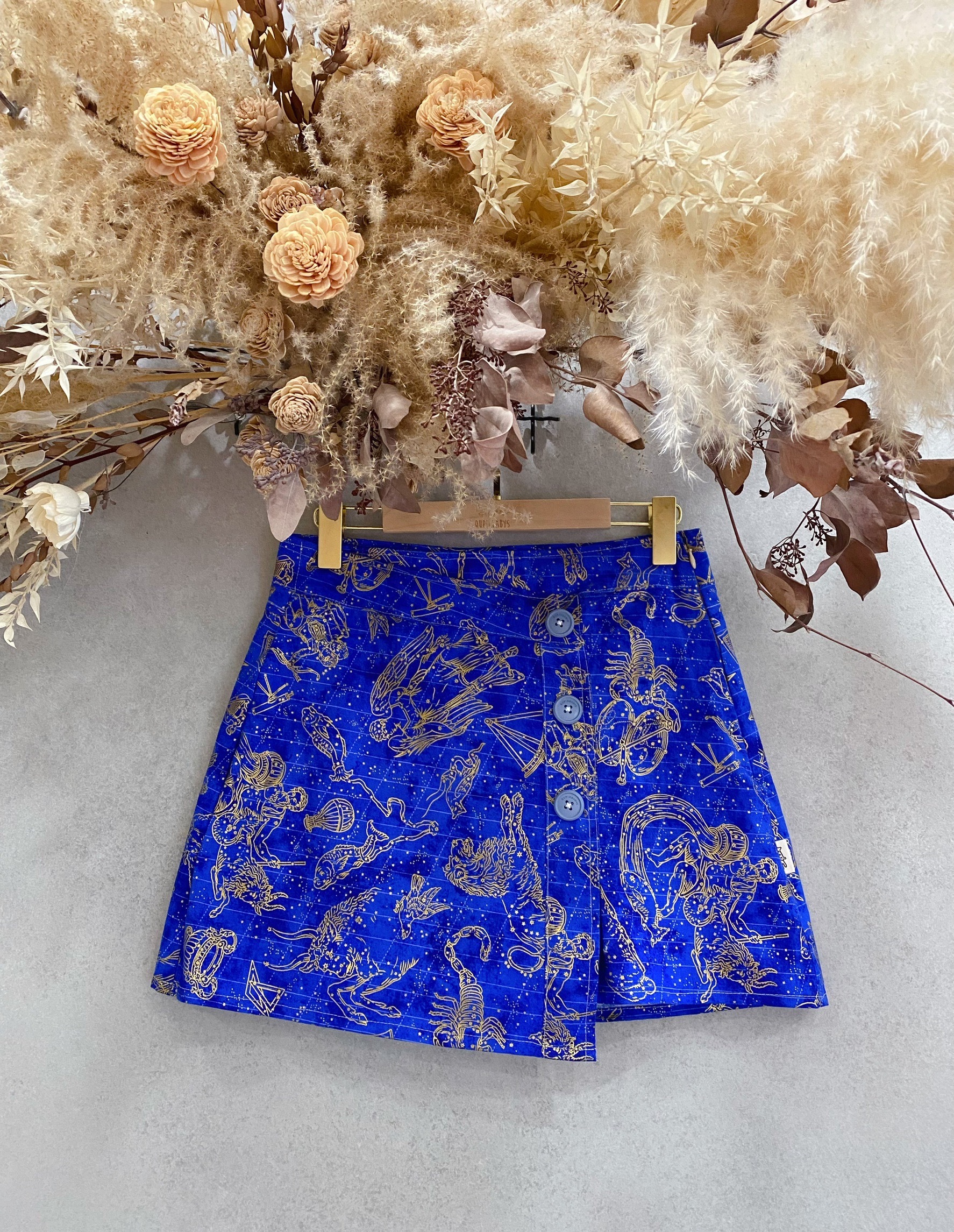 燙金寶藍星座 媽咪斜邊排釦連褲短裙(S)