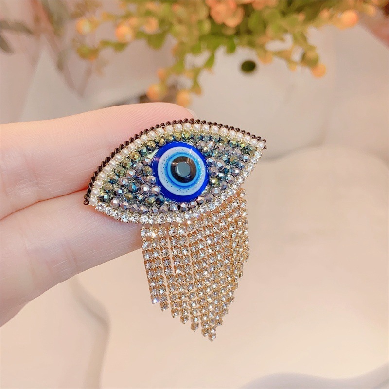 流蘇碎鑽眼睛胸針