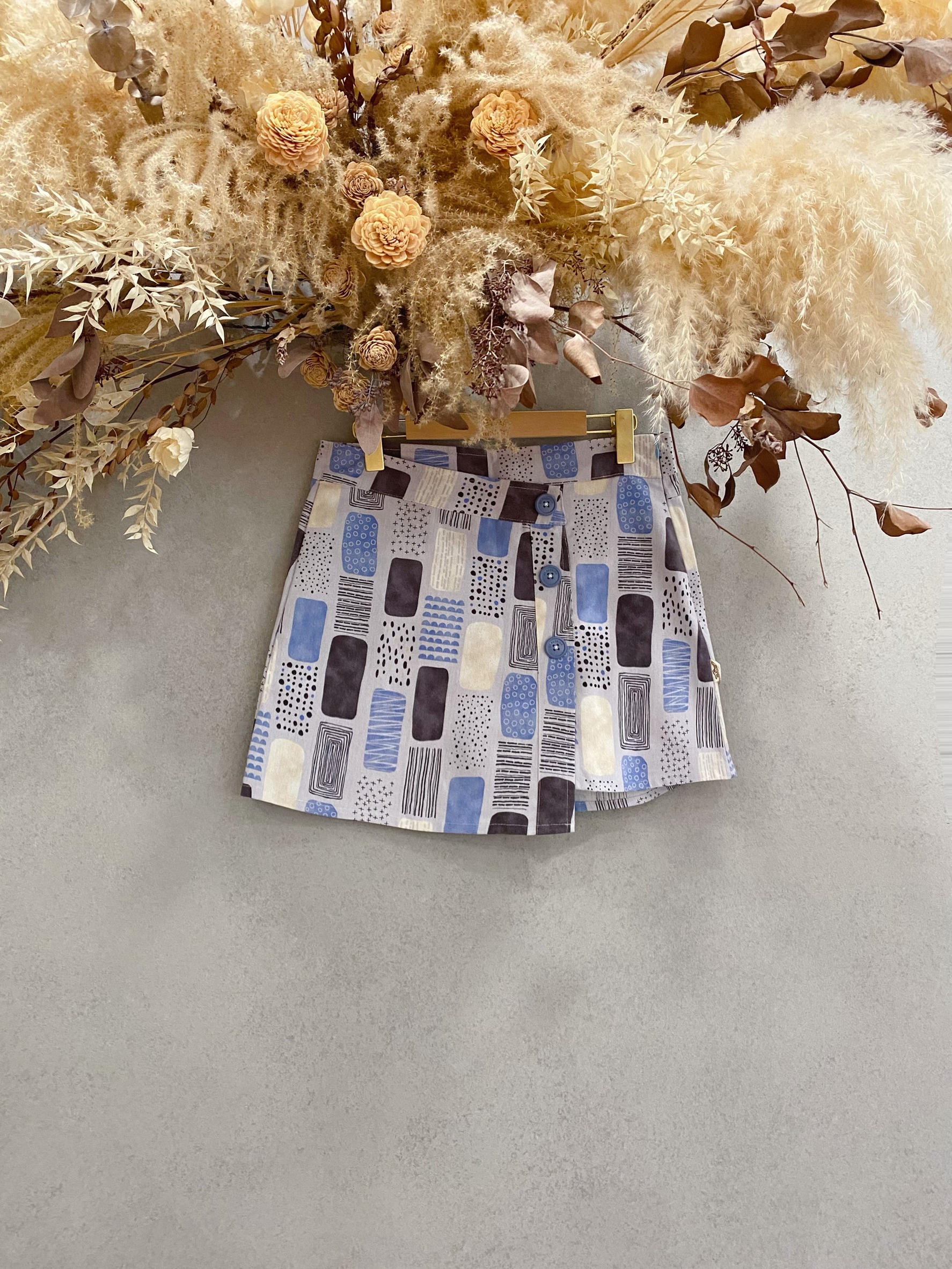 藍色塊 媽咪斜邊排釦連褲短裙(M)