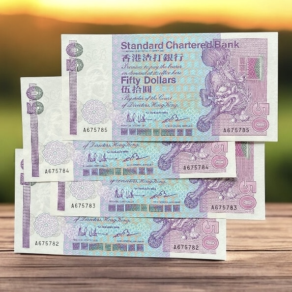 1985 Standard Chartered Bank $50 Banknote First Year of Issue A675782-85 (UNC Condition)