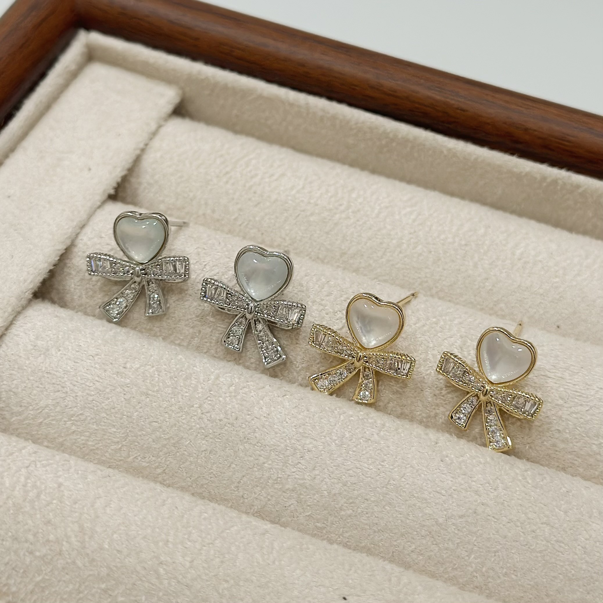 B309貓眼愛心蝴蝶結耳針