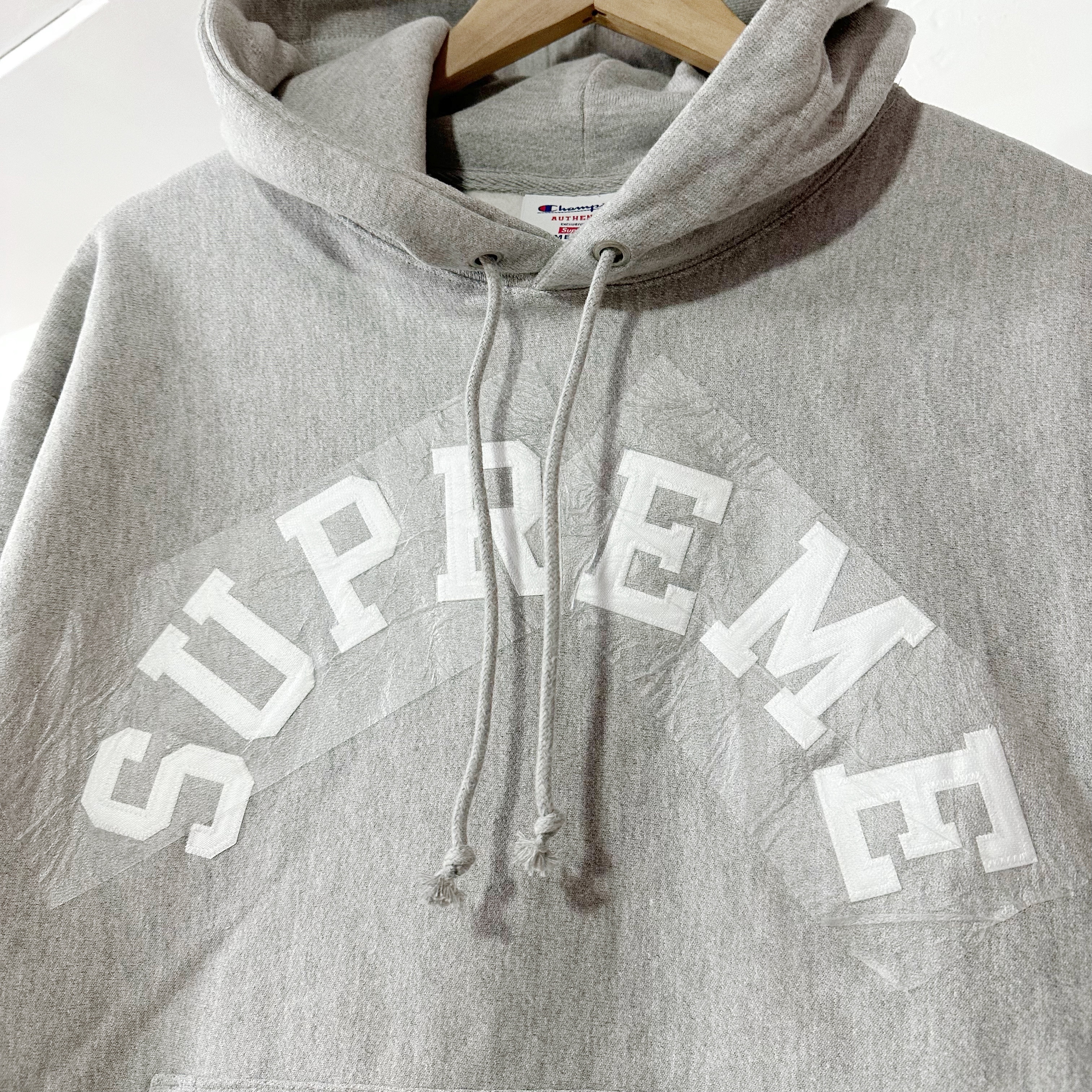 SUPREME  SS25 CHAMPION® HOODED SWEATSHIRT Heather Grey