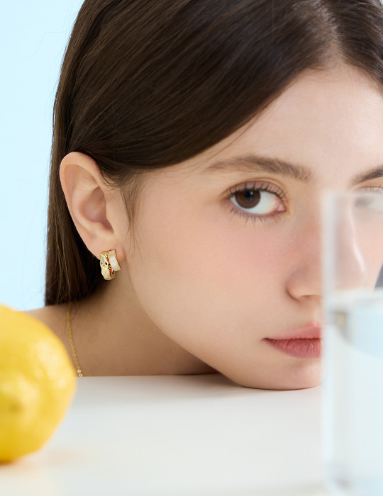 百搭貓眼菱格。銀針耳環