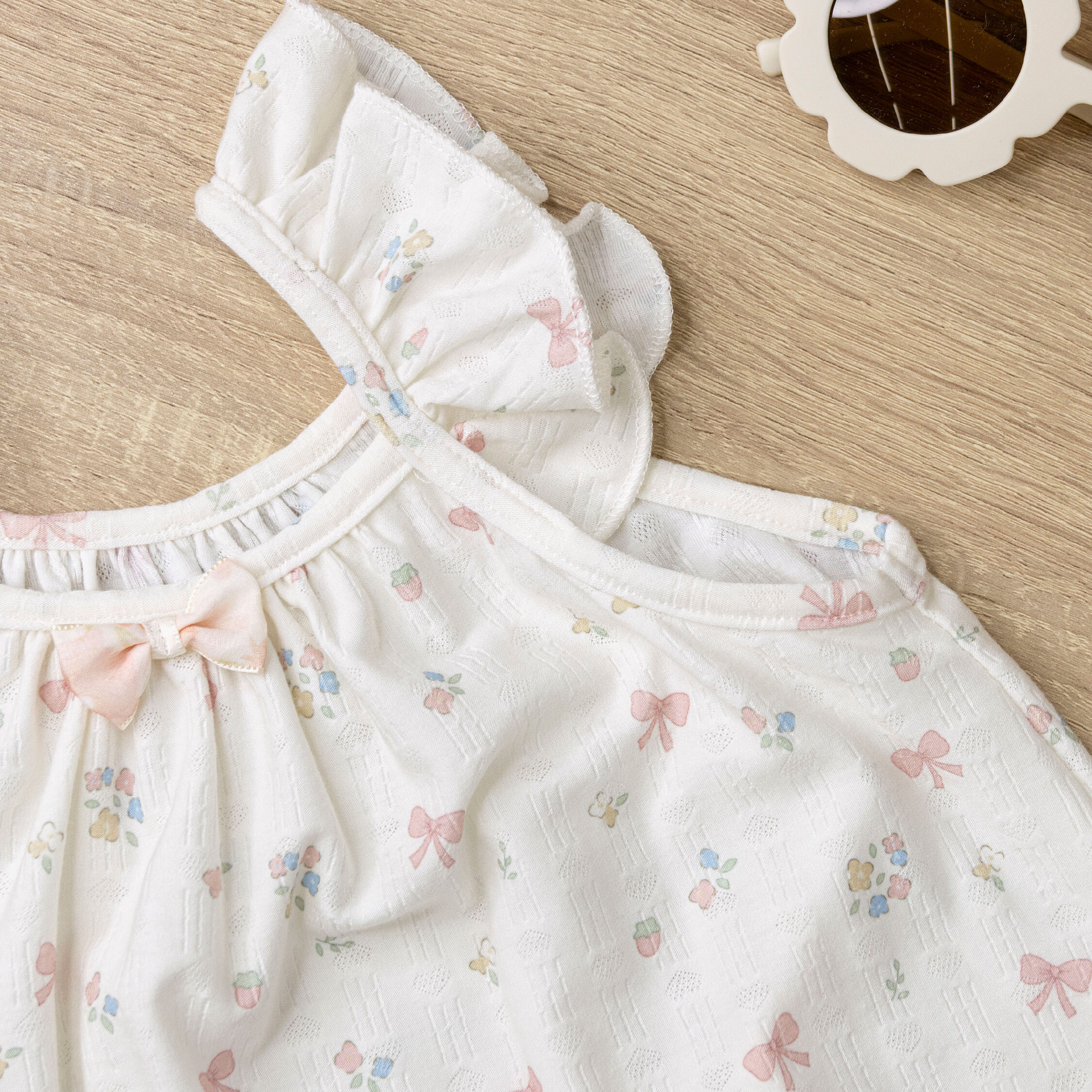 【JG0516】花花蝴蝶結荷葉袖設計包屁衣