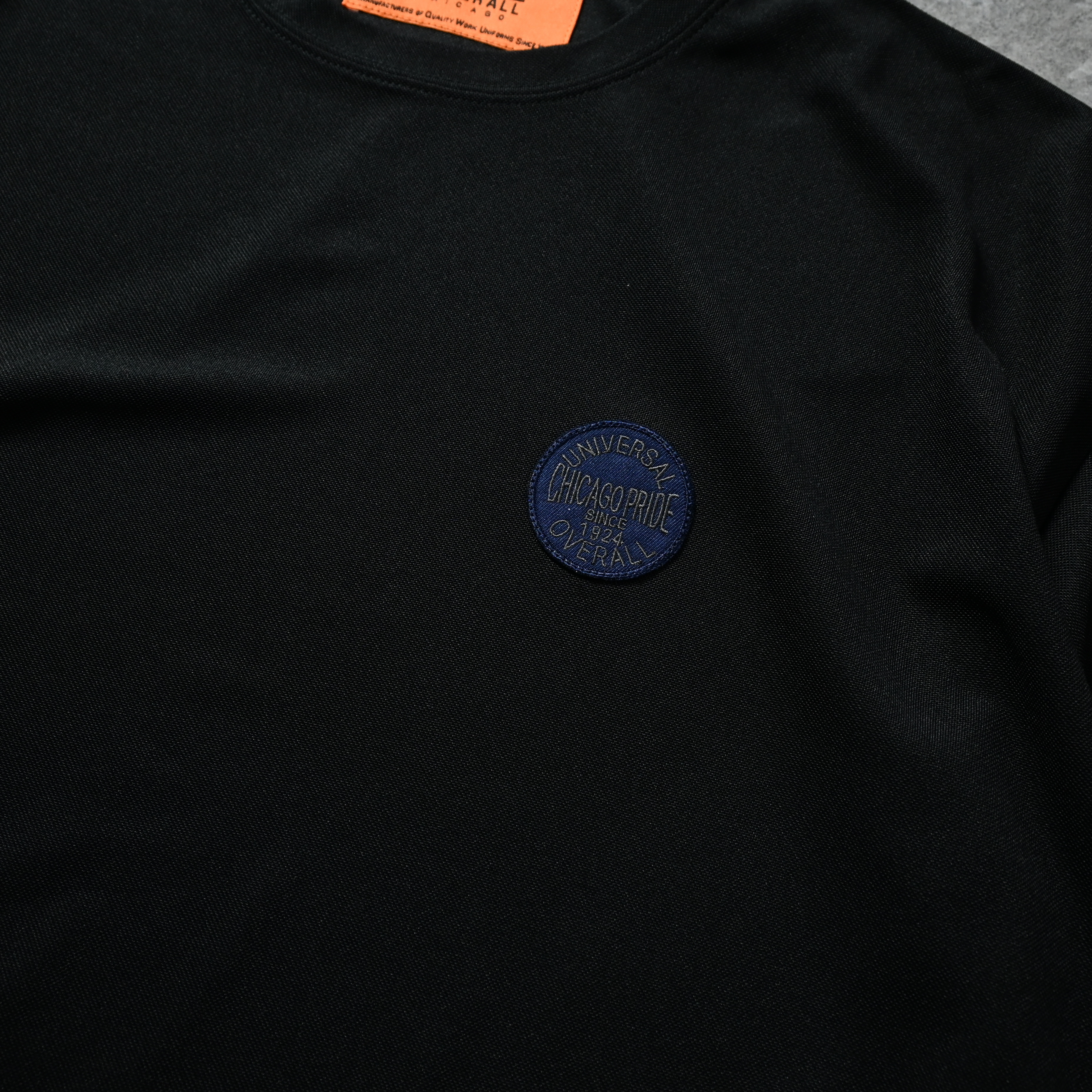 Universal Overall Emblem Tee