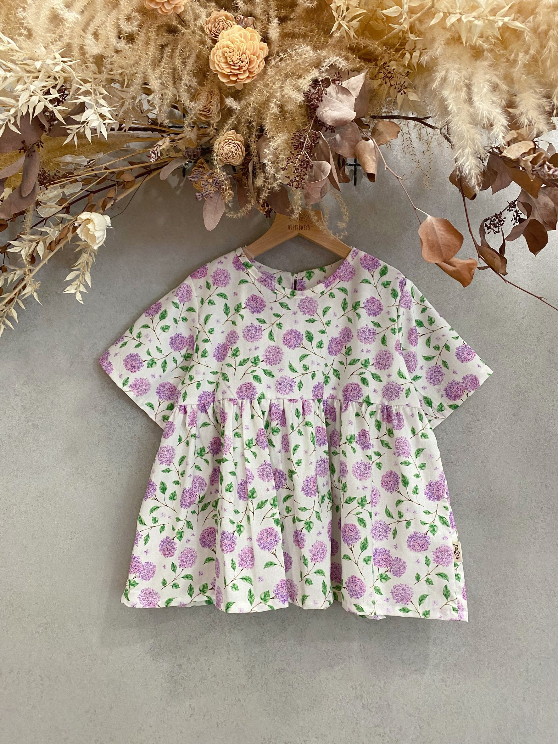 紫繡球 裙擺搖搖短袖上衣(130)