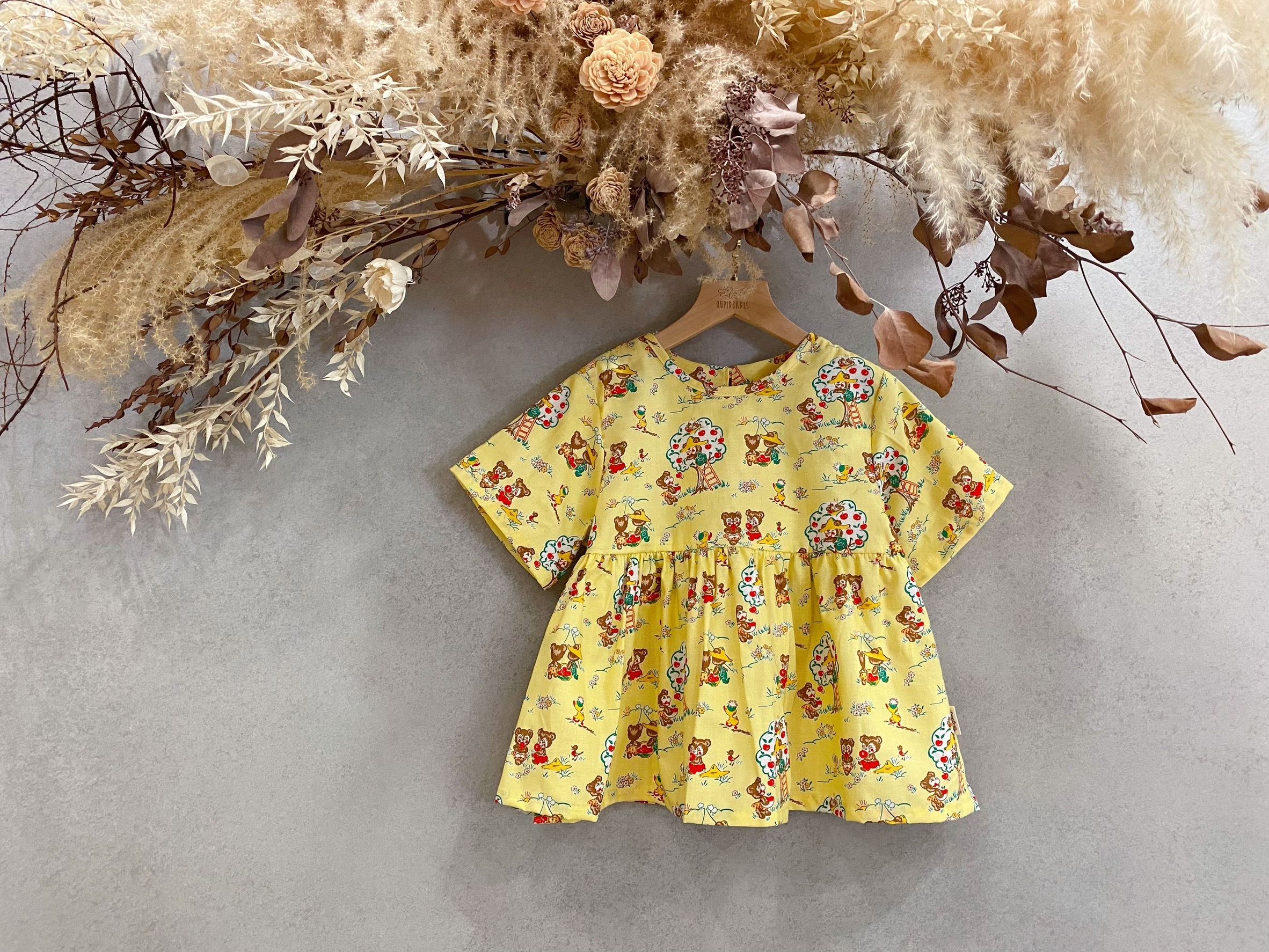 黃底摘蘋果 裙擺搖搖短袖上衣(120)