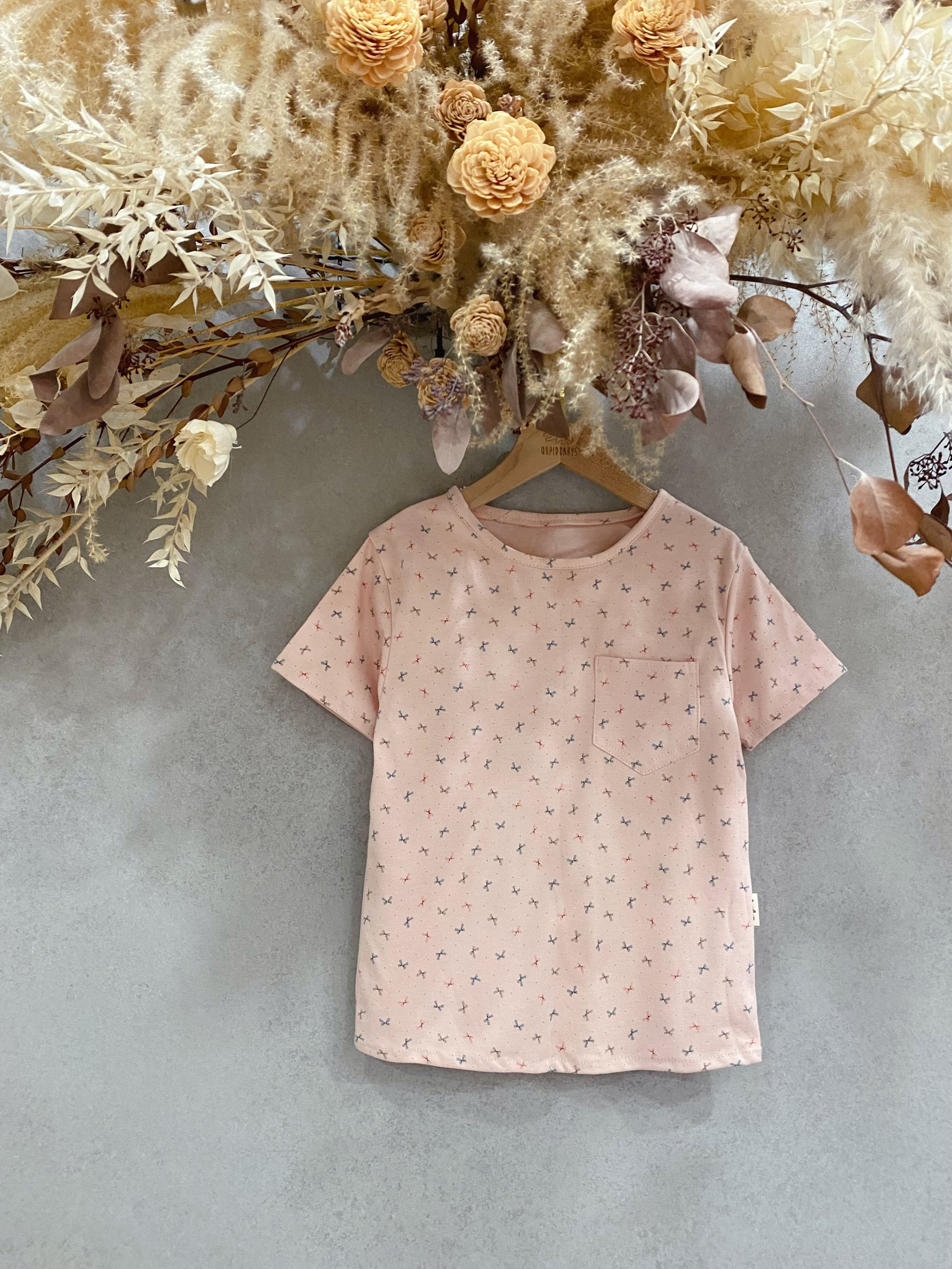 小蝴蝶結 彈性口袋上衣(120)