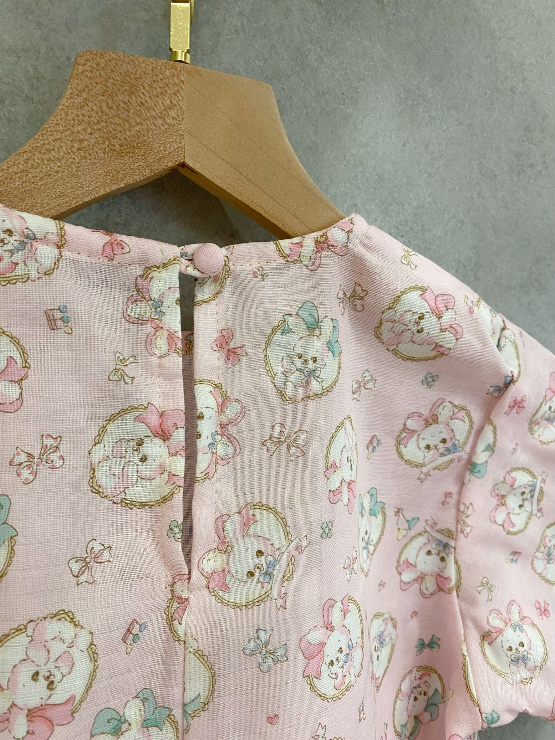 粉蝴蝶結兔子 口袋短袖上衣(120)