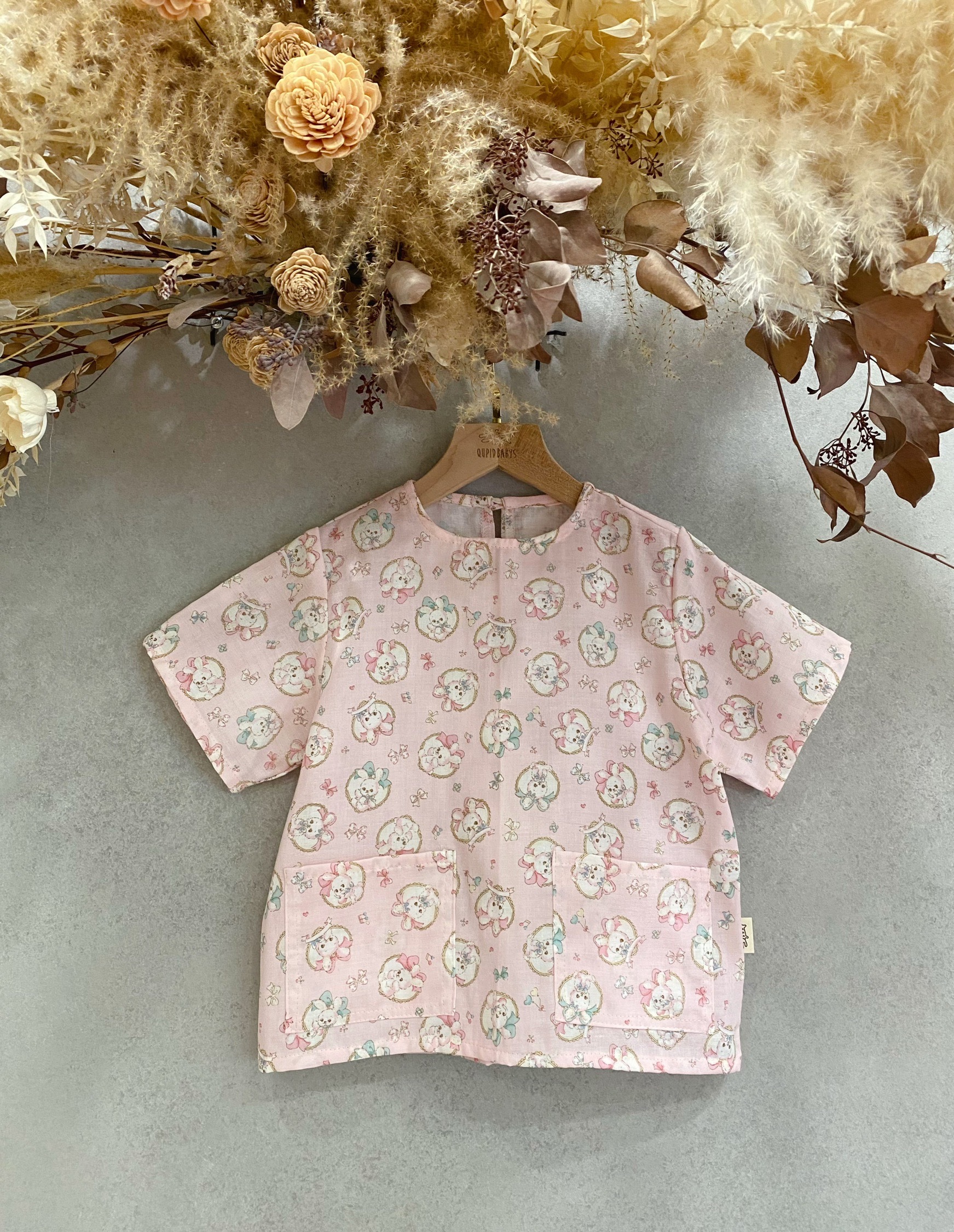 粉蝴蝶結兔子 口袋短袖上衣(120)
