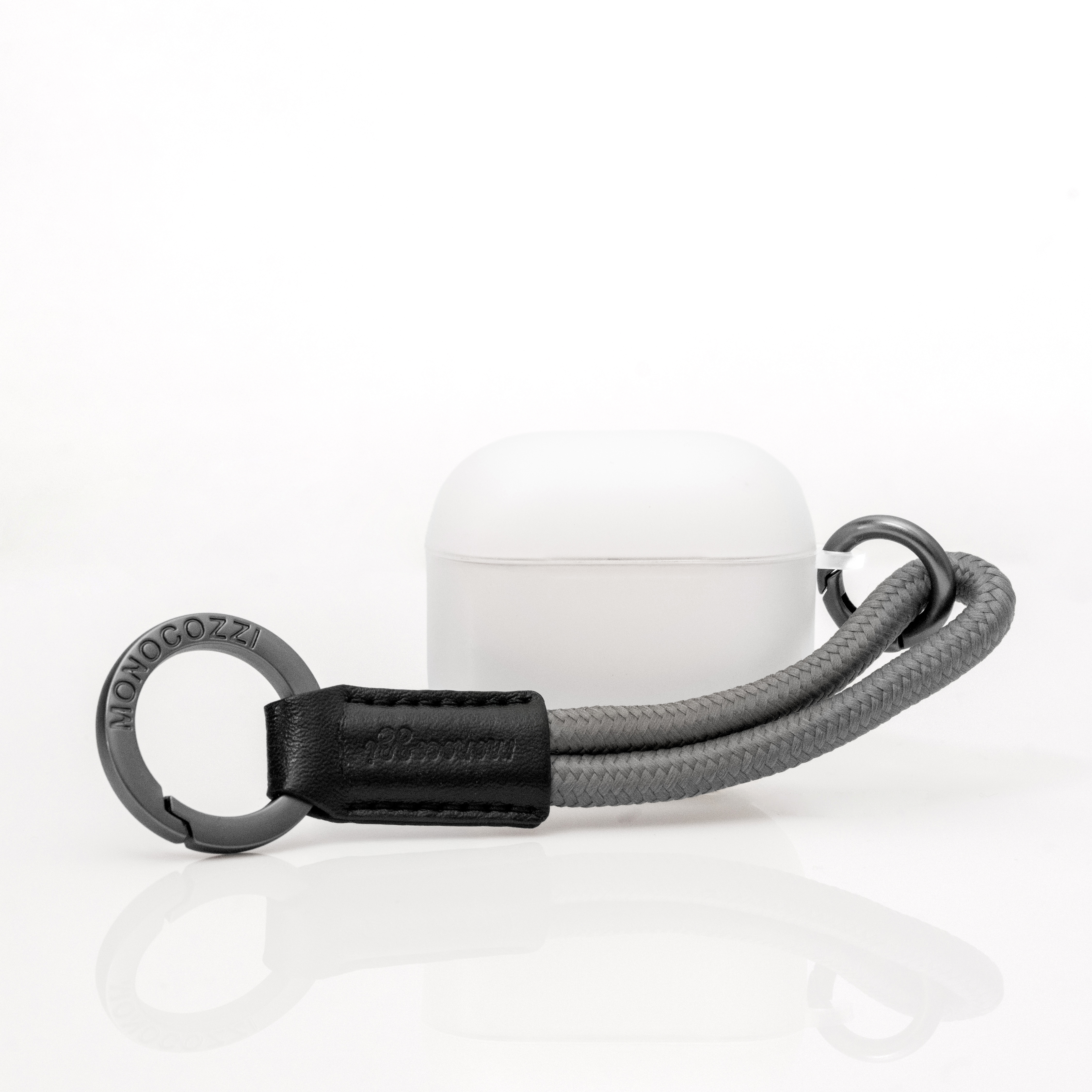 ESSENTIALS | Dust Proof Translucent Soft Plastic Case for AirPods 4 with Strap  - Translucent/  Charcoal