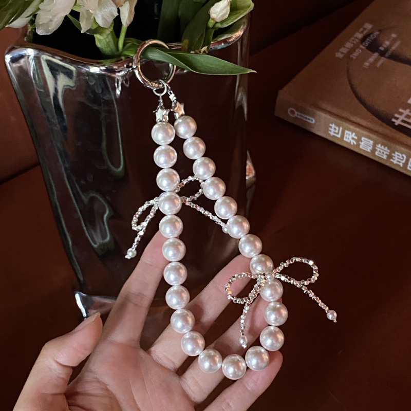 《6014》珍珠爆閃蝴蝶結手機鏈