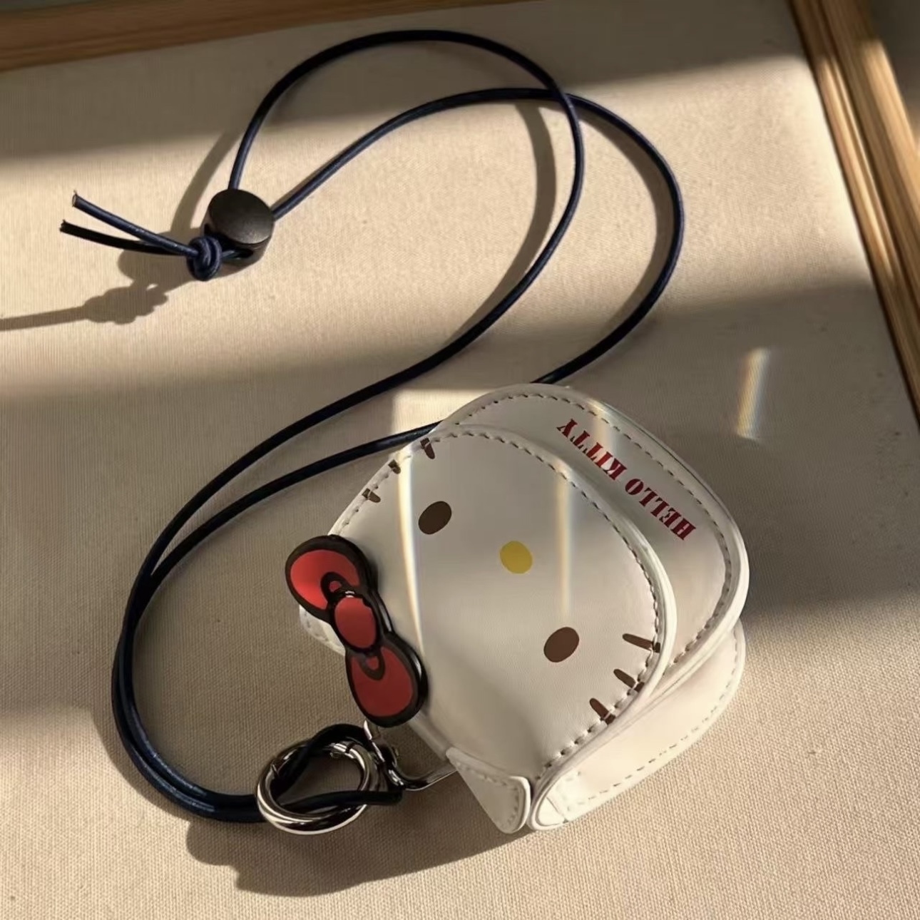 三麗鷗 SANRIO x 正港ZGO 凱蒂貓 KITTY 迷你耳機包 磁吸開扣 掛繩小包 /預購