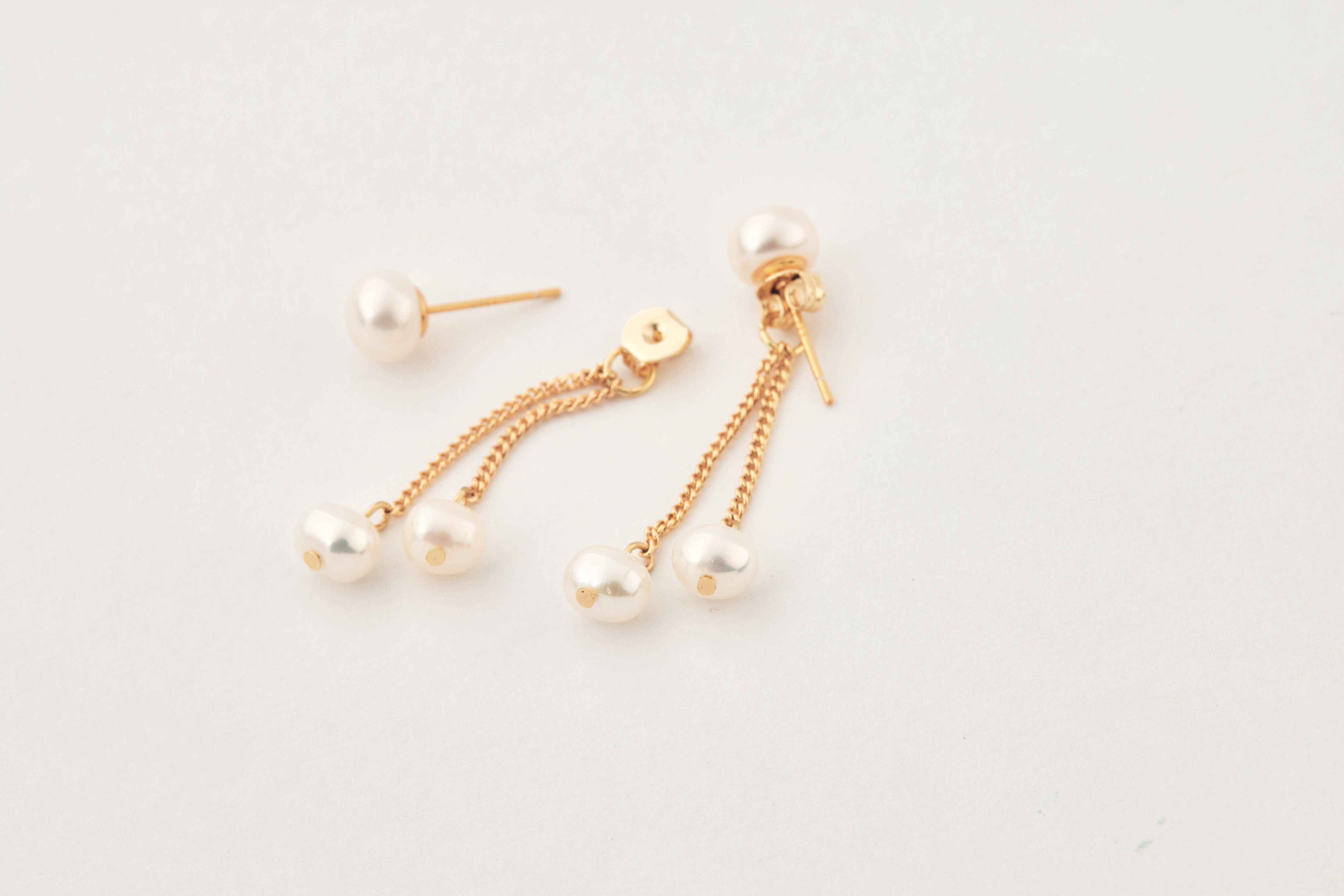 14kgf兩戴式珍珠耳環分開展示，呈現可拆式設計