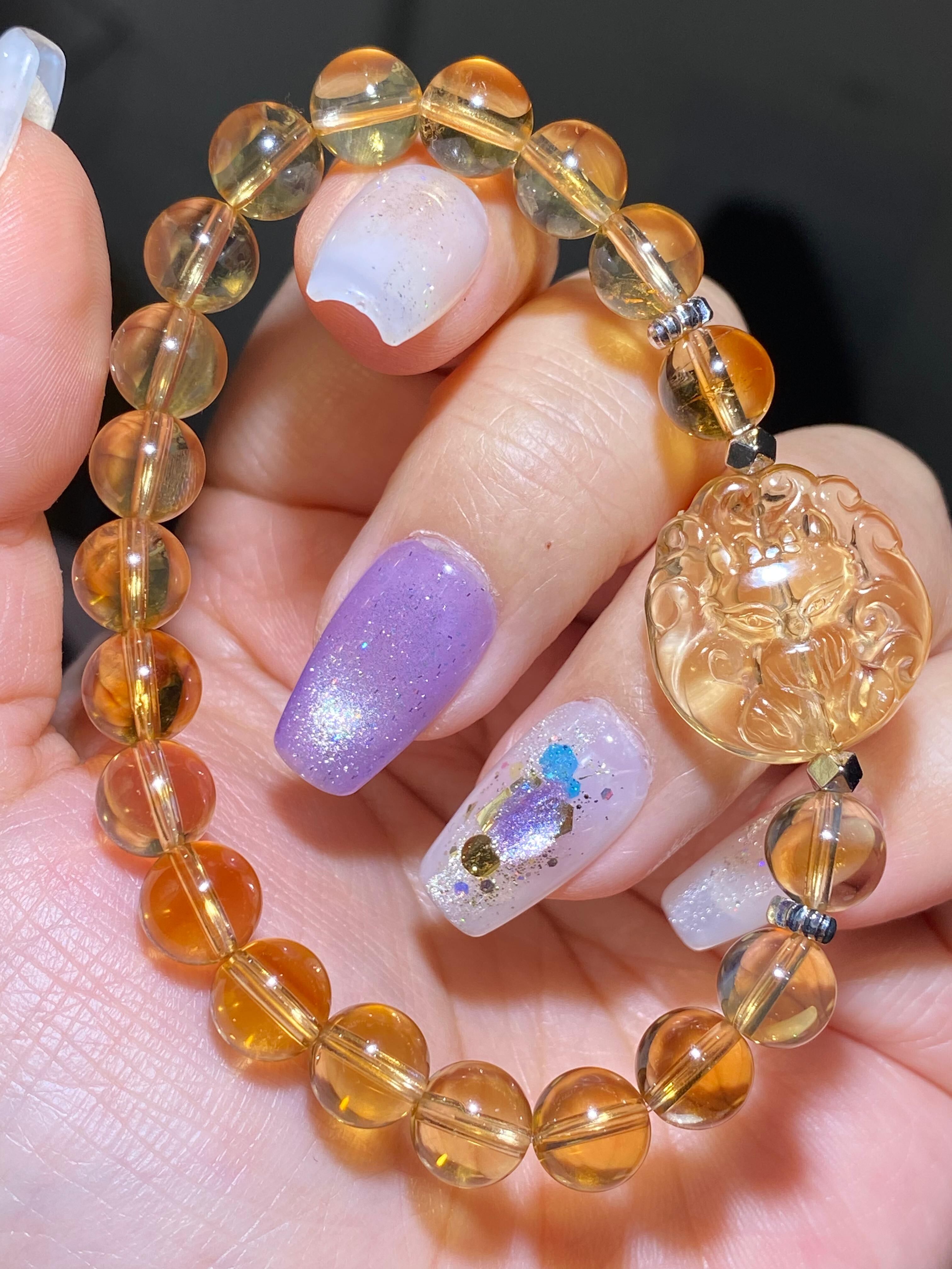 8-8.3MM高質巴西深黃水晶九尾狐手串