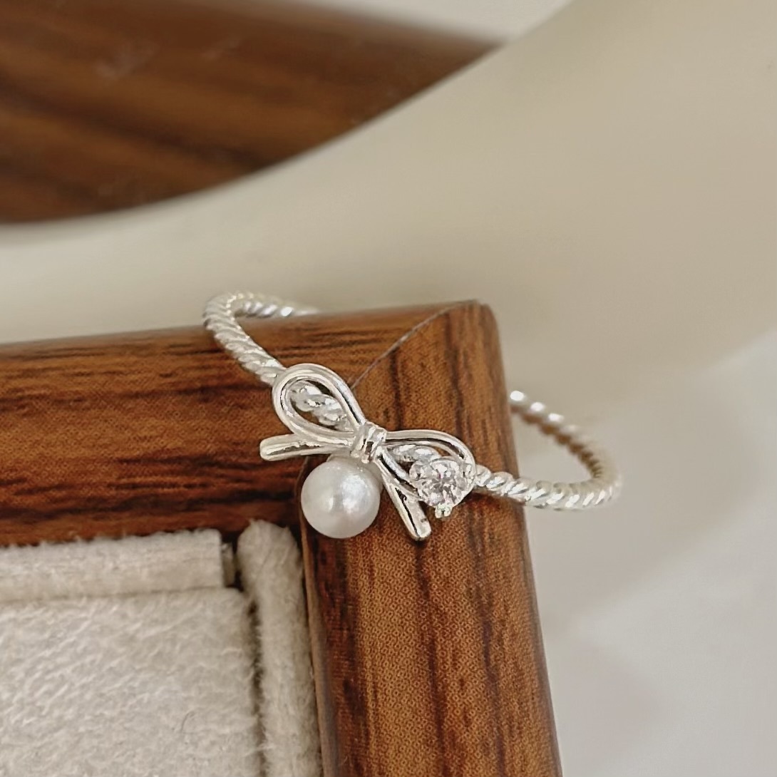 F93蝴蝶結珍珠純銀線戒