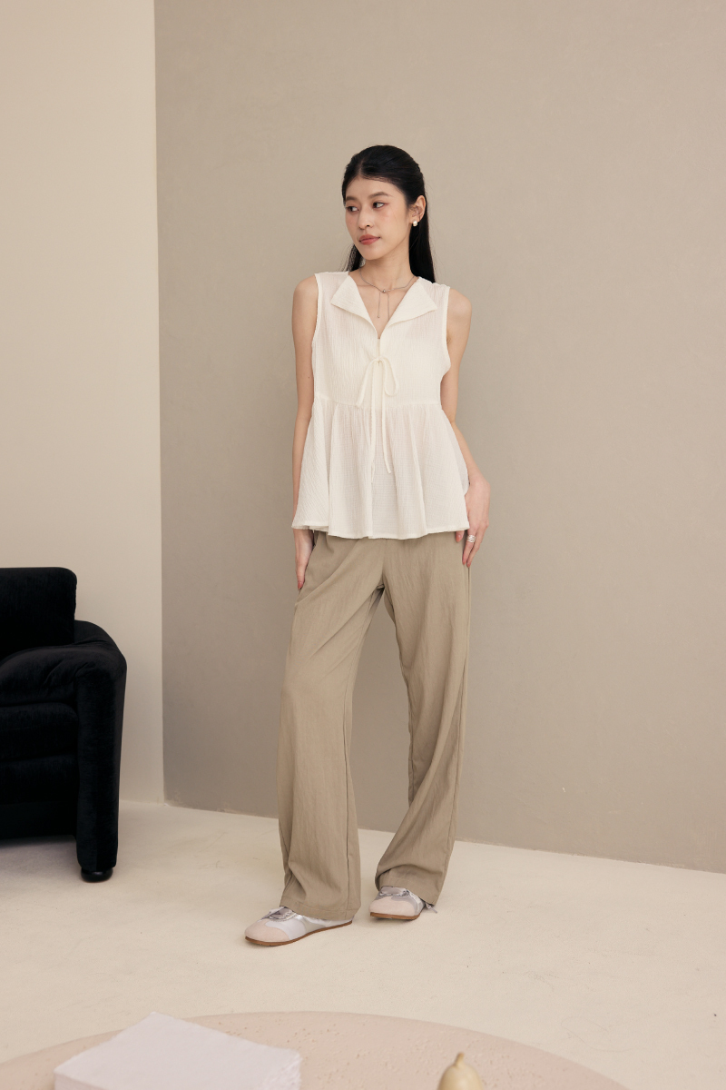 無袖半開襟壓紋傘襬上衣