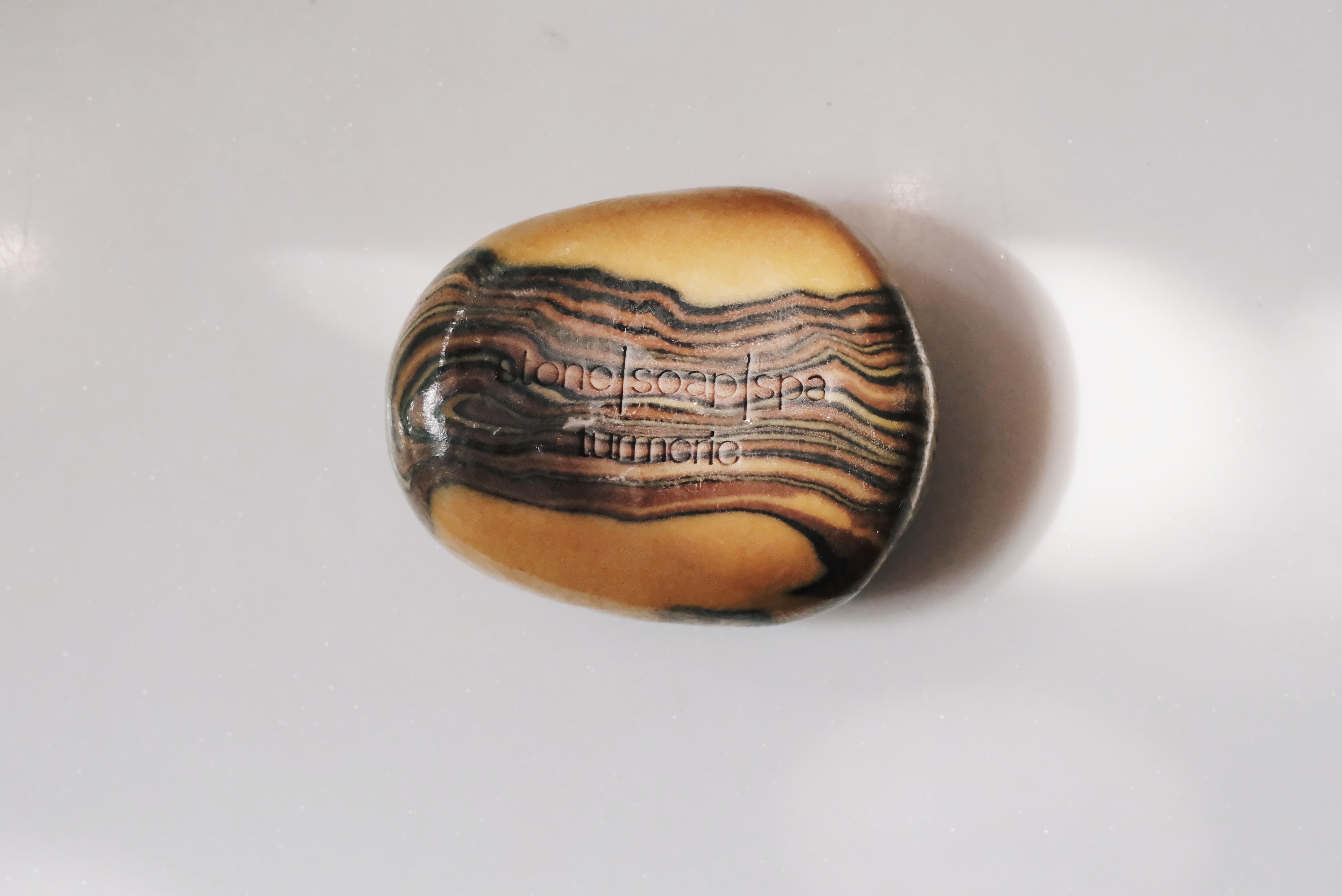 Stone Soap Spa｜鵝卵石香氛輕柔磨砂皂｜琥珀橙舞