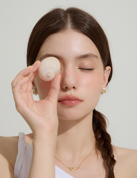 輕奢珍珠半圈鑽。夾式耳環