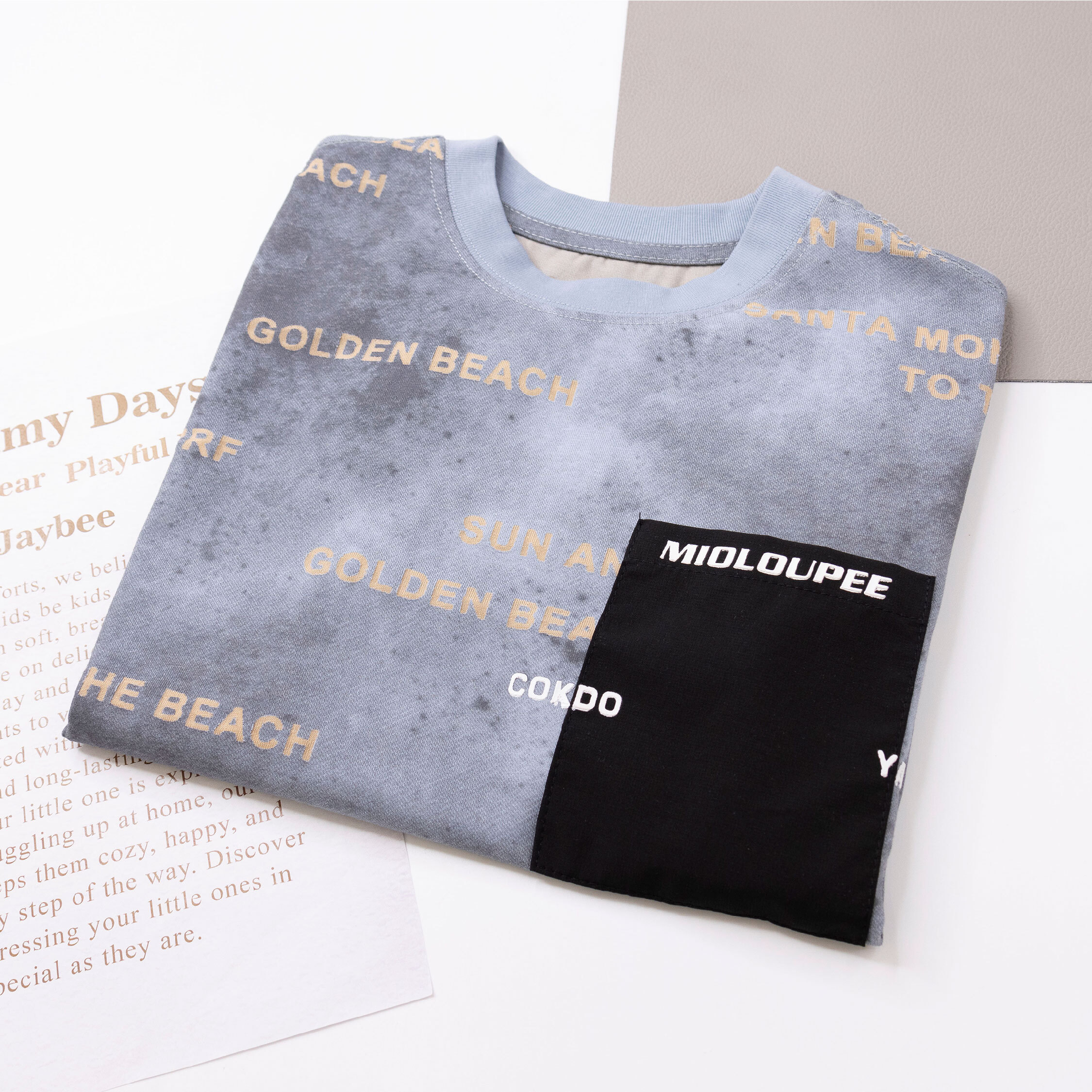 【H50141】藝術暈染英字口袋上衣