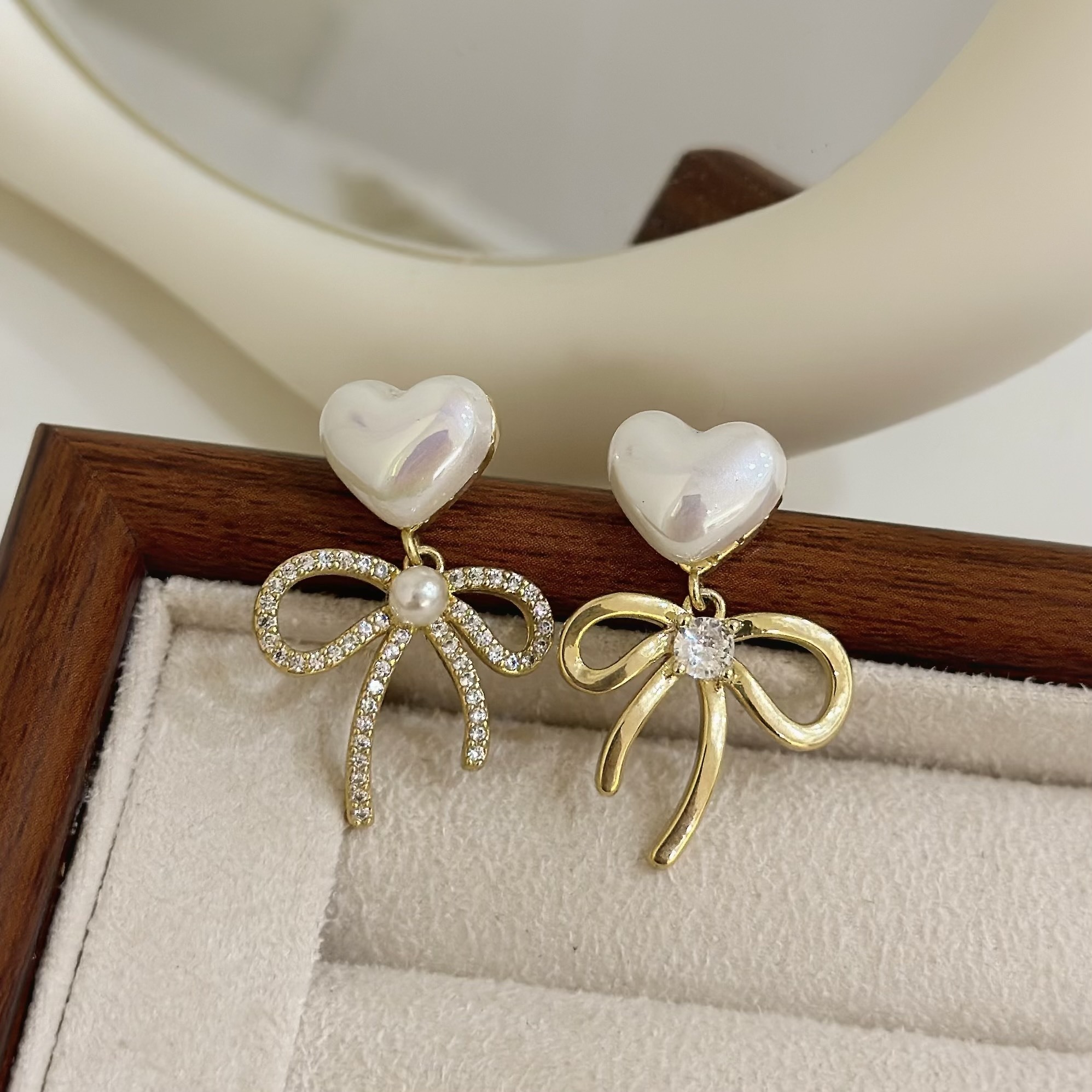 B349珍珠愛心排鑽蝴蝶結垂吊