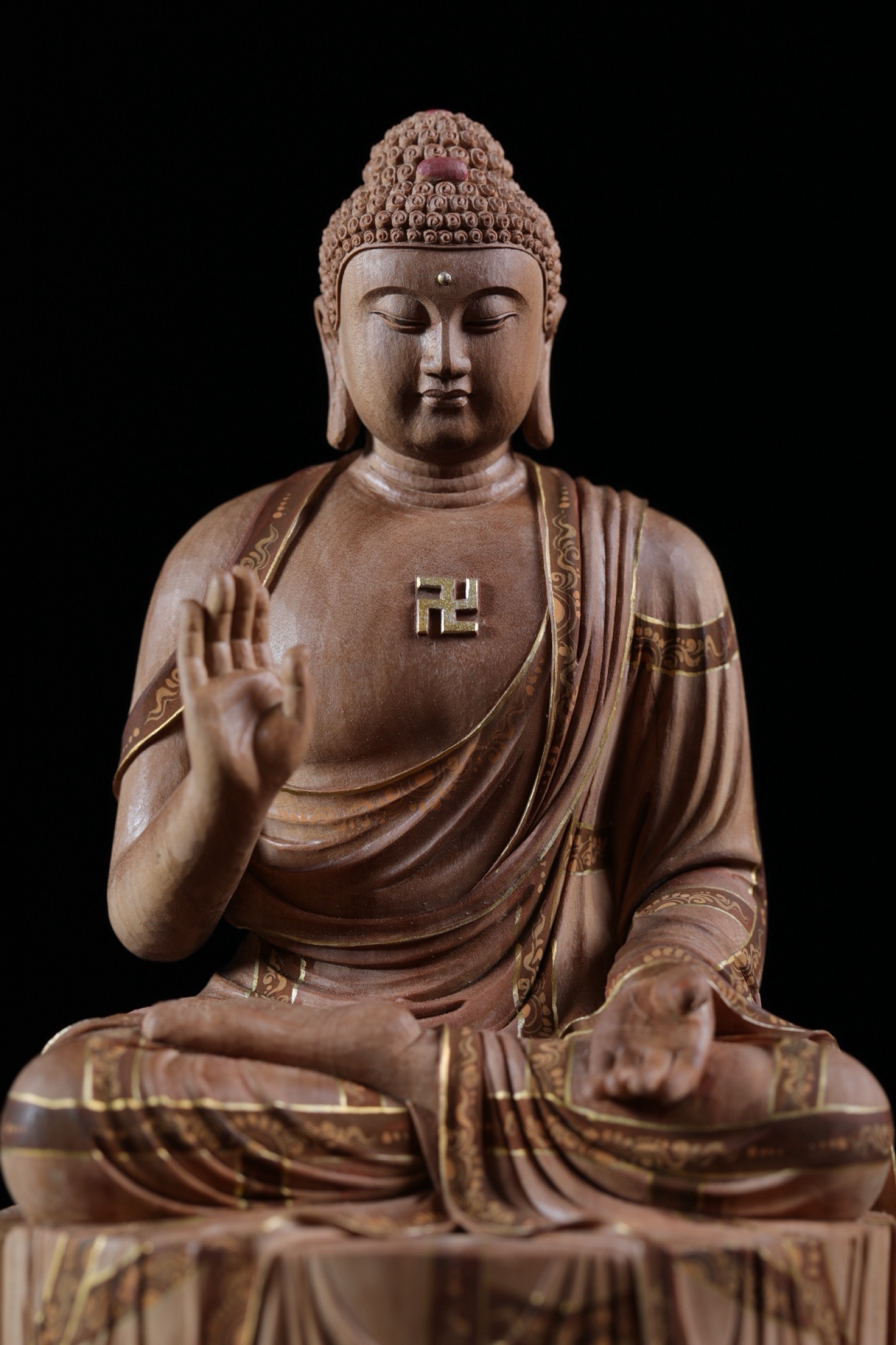Buddha Sakyamuni - a century-old statue made of Indian sandalwood