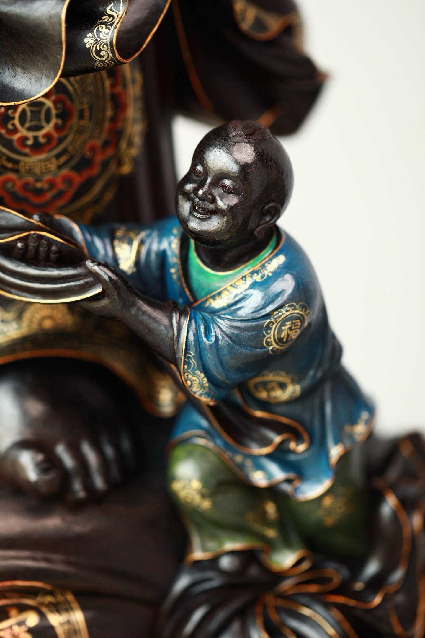 Five children playing with Maitreya - a statue made of whole material by a provincial master from Indian red sandalwood