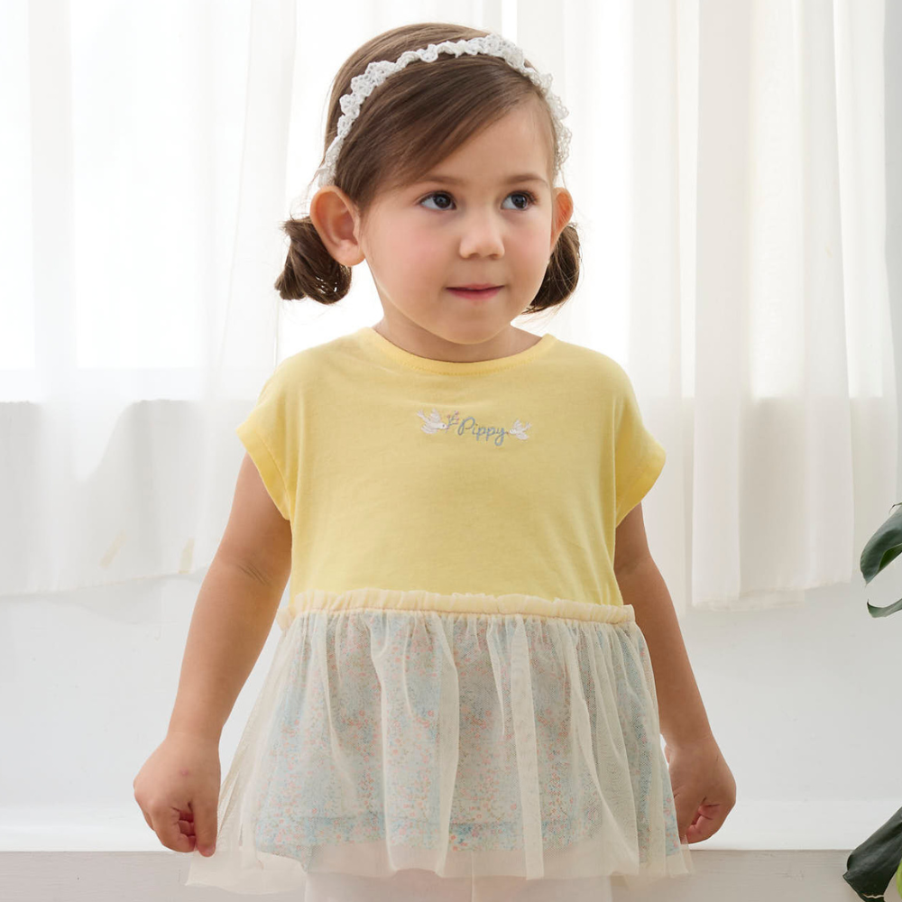 PIPPY明亮下擺剪接碎花網紗純棉圓領上衣 黃