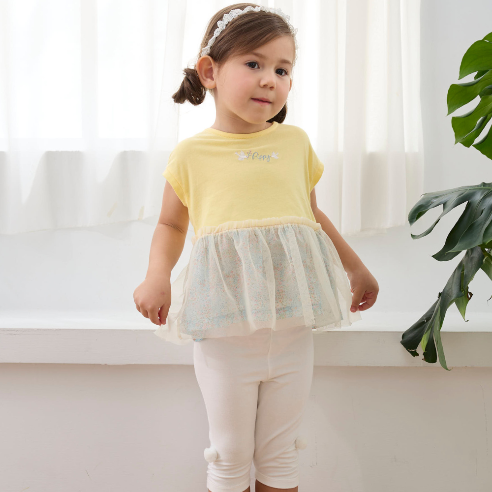 PIPPY明亮下擺剪接碎花網紗純棉圓領上衣 黃