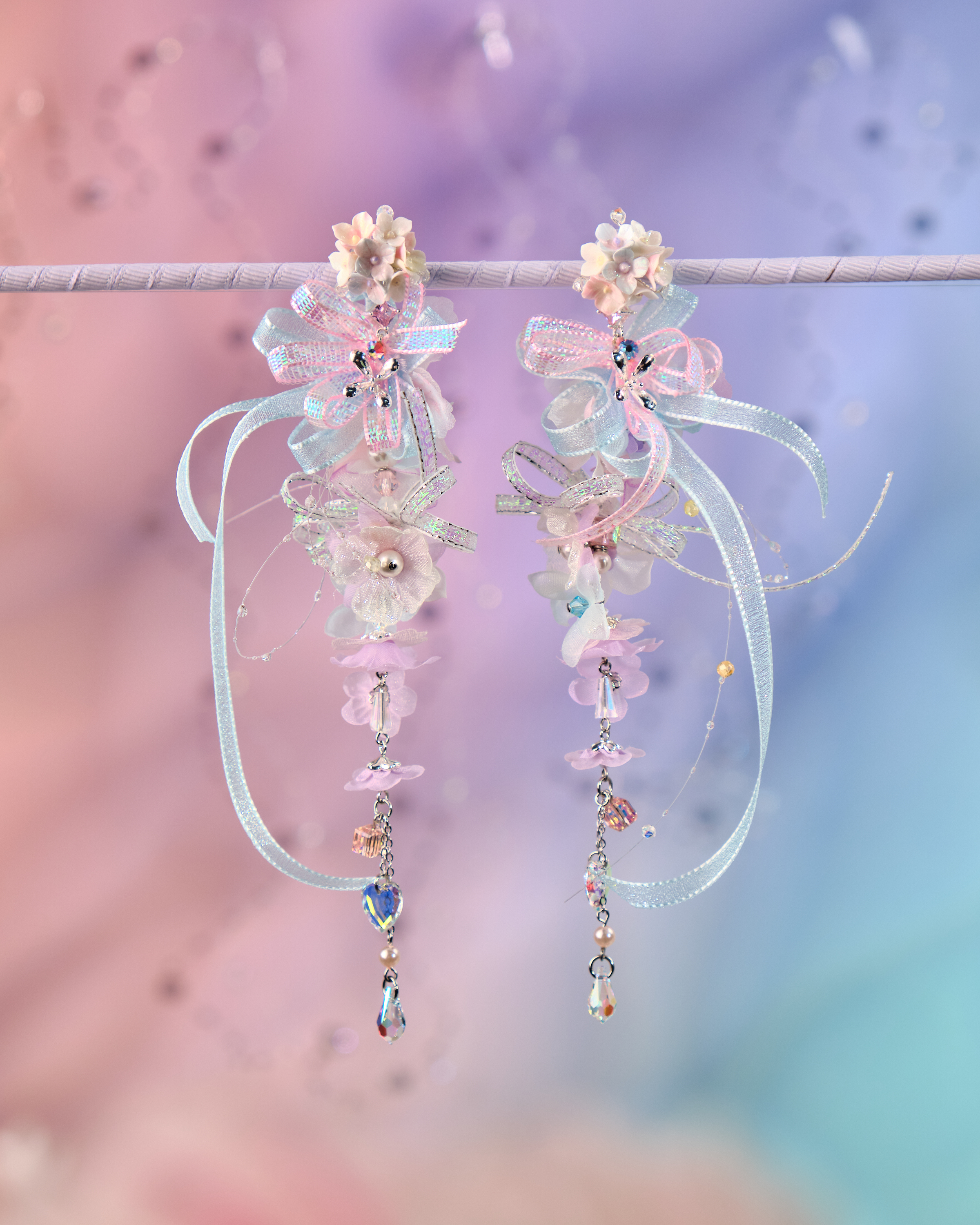 12080 絲帶小花羽翼耳環