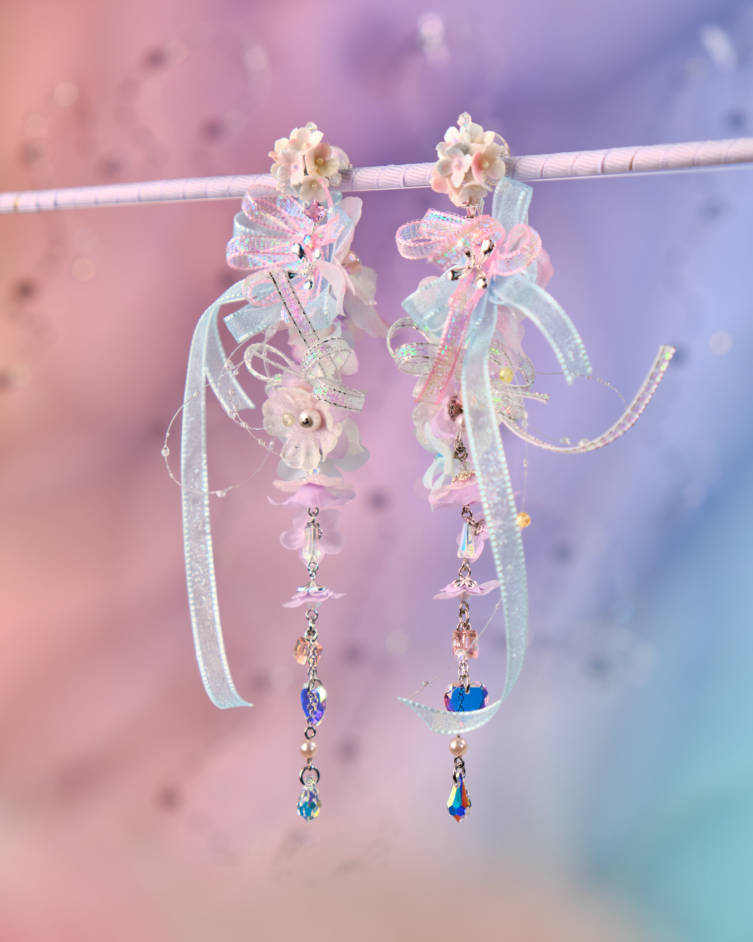 12080 絲帶小花羽翼耳環