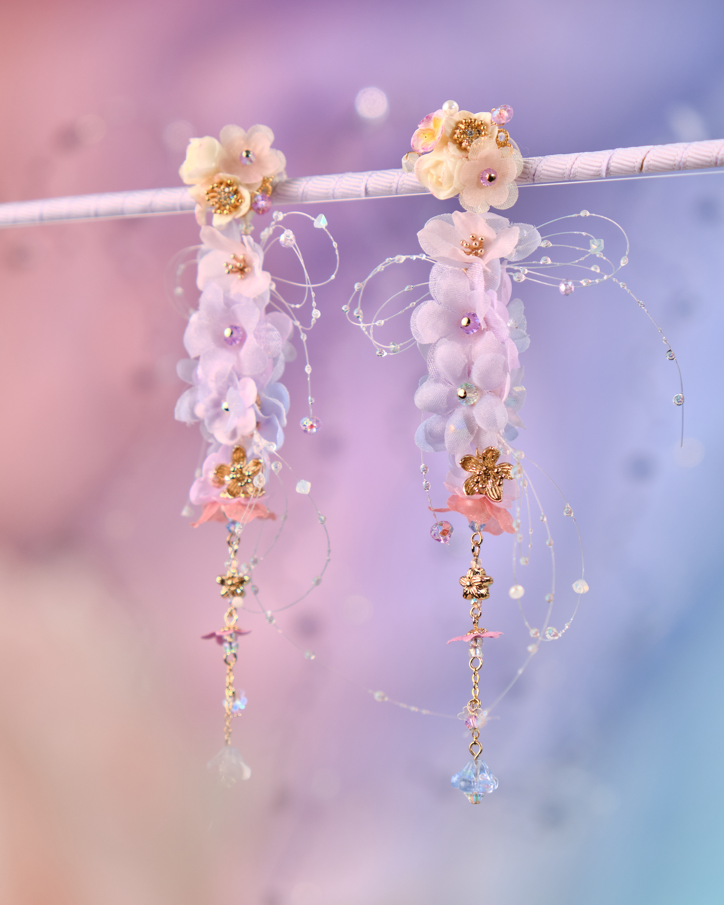 12078 絲帶小花羽翼耳環