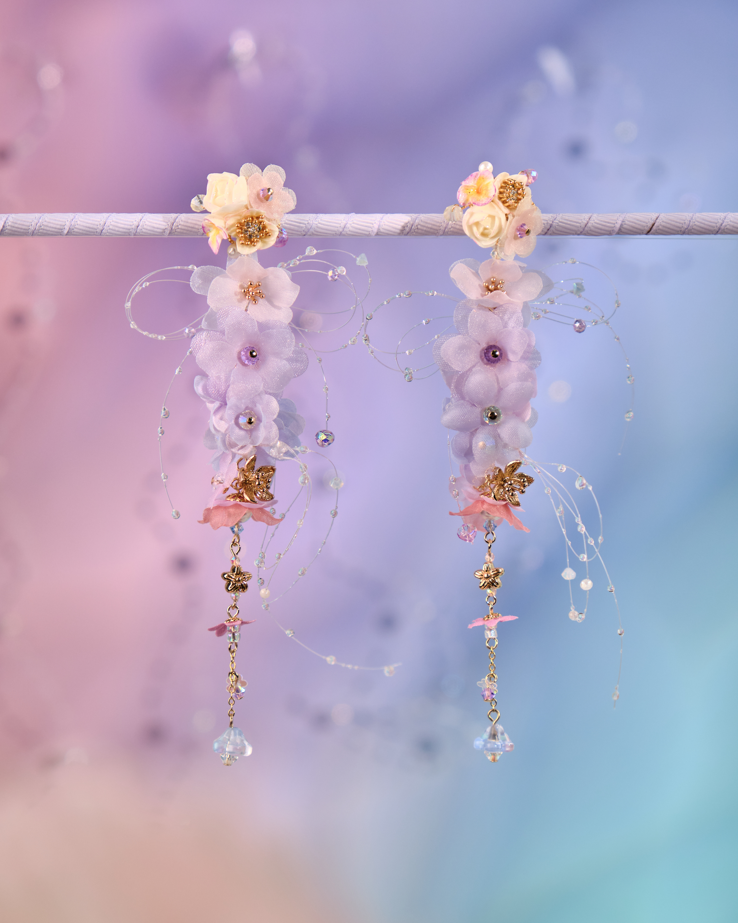 12078 絲帶小花羽翼耳環